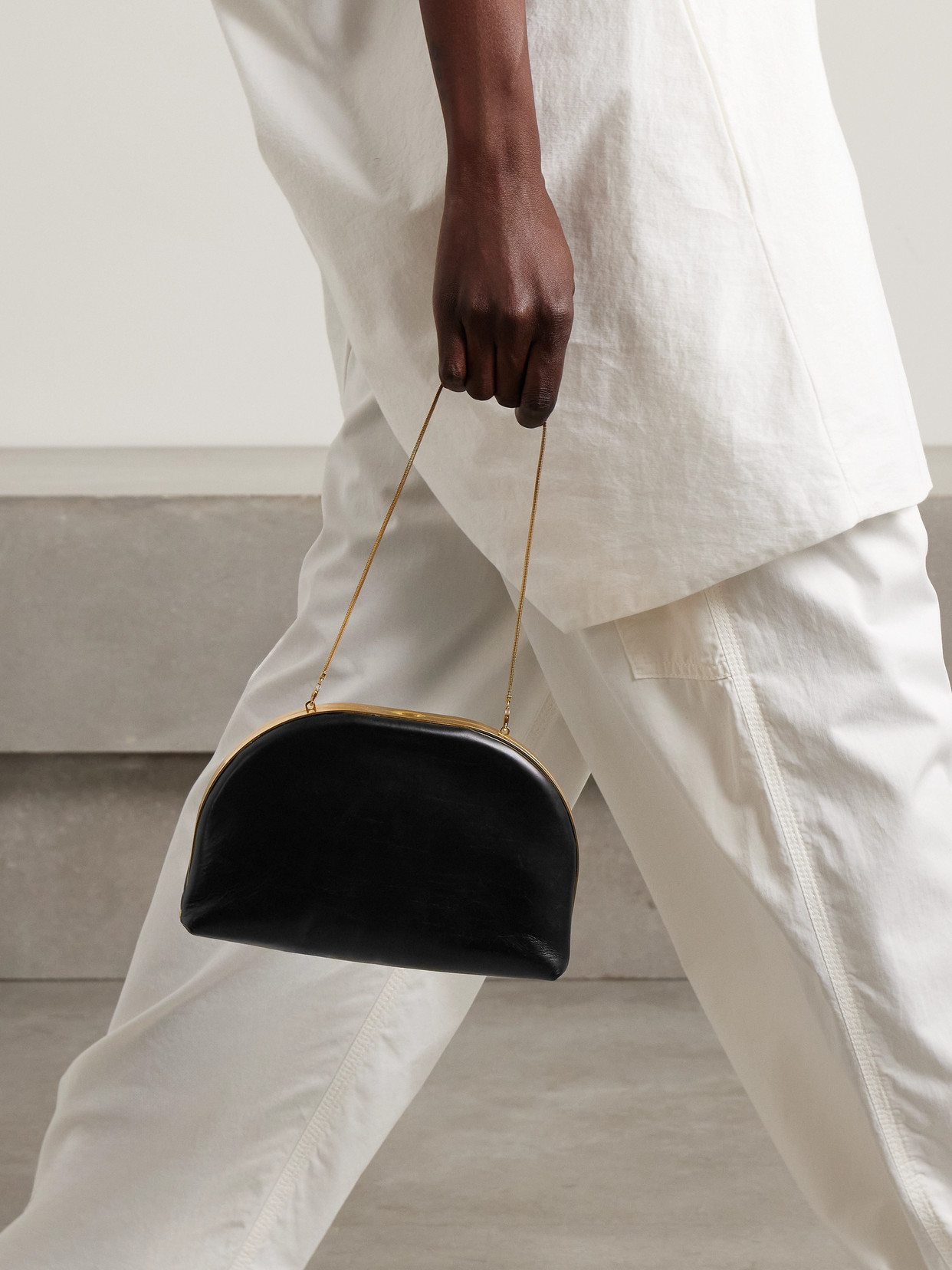 The Row Sylvia Leather Clutch In Black