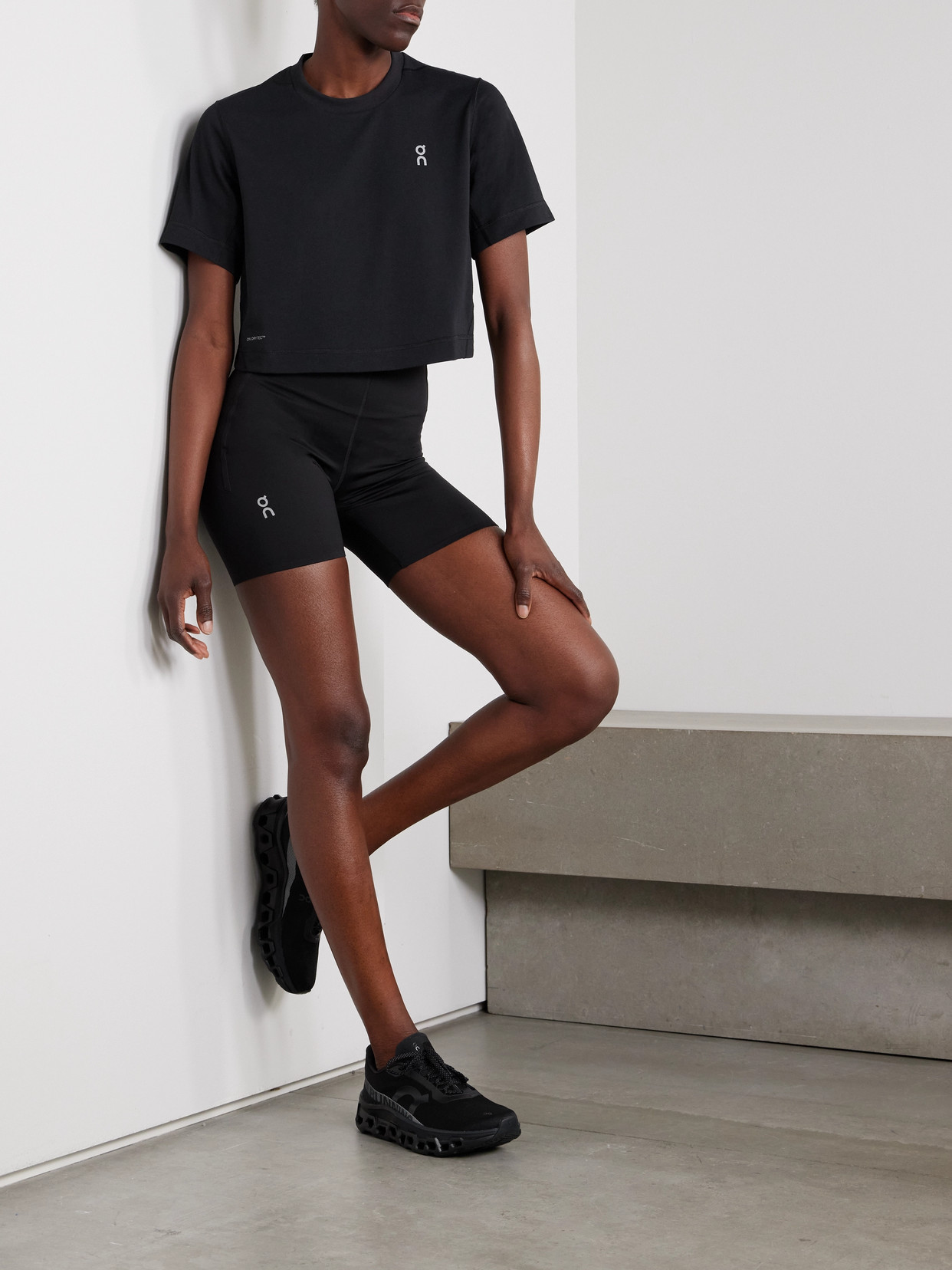 On Train Cropped Recycled-jersey T-shirt In Black