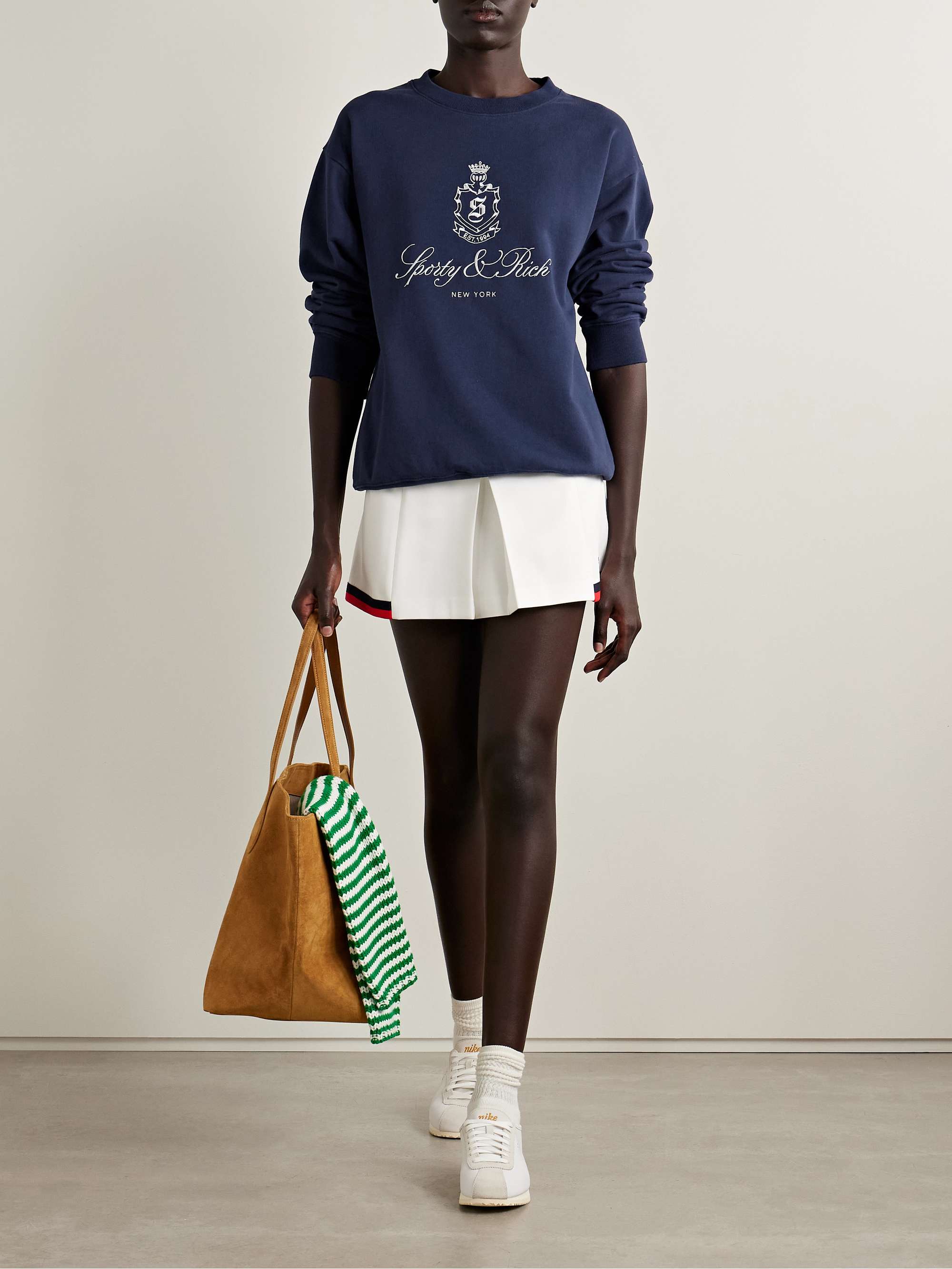 SPORTY & RICH 