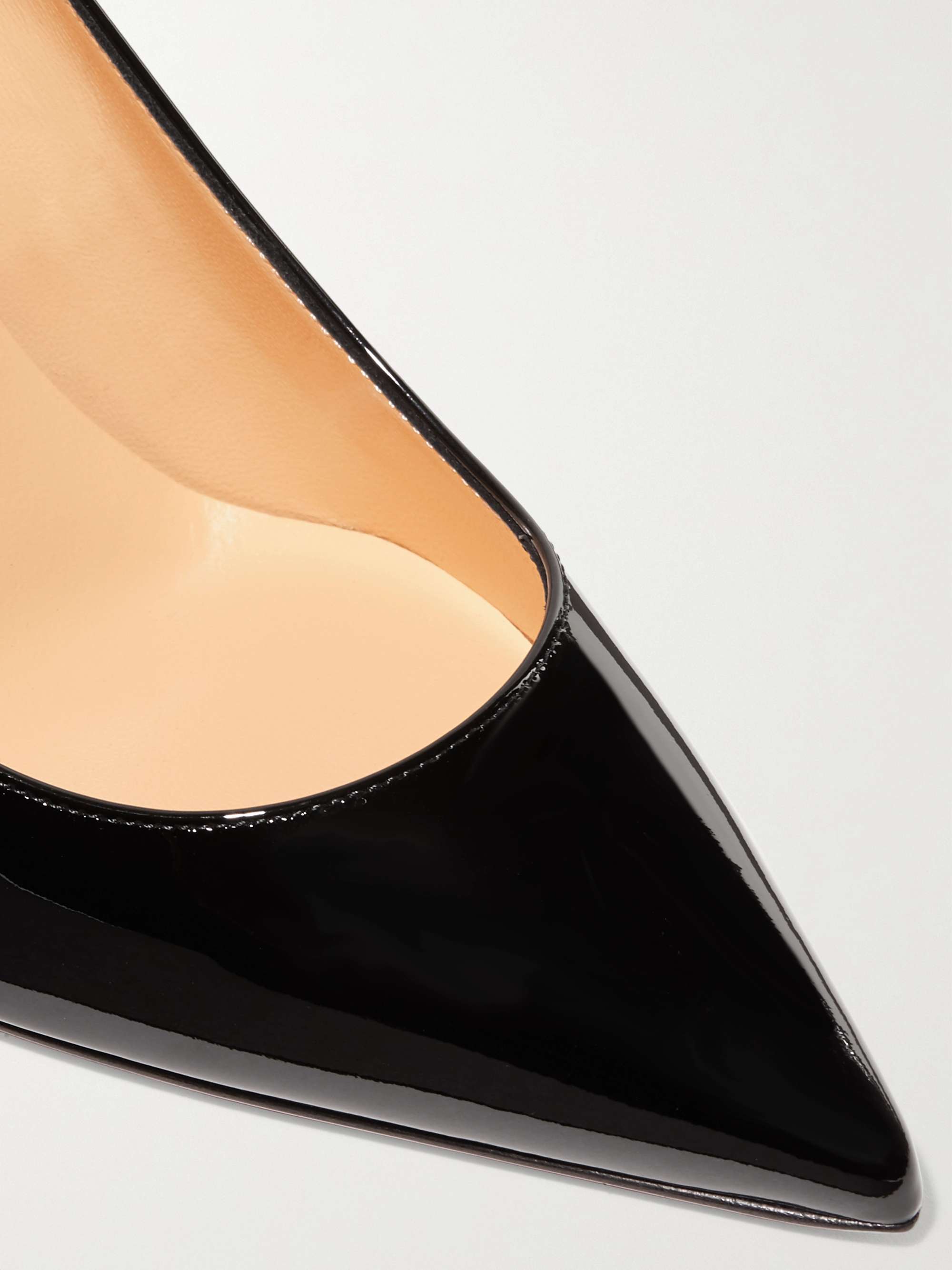 Pointed toe pumps in black patent leather