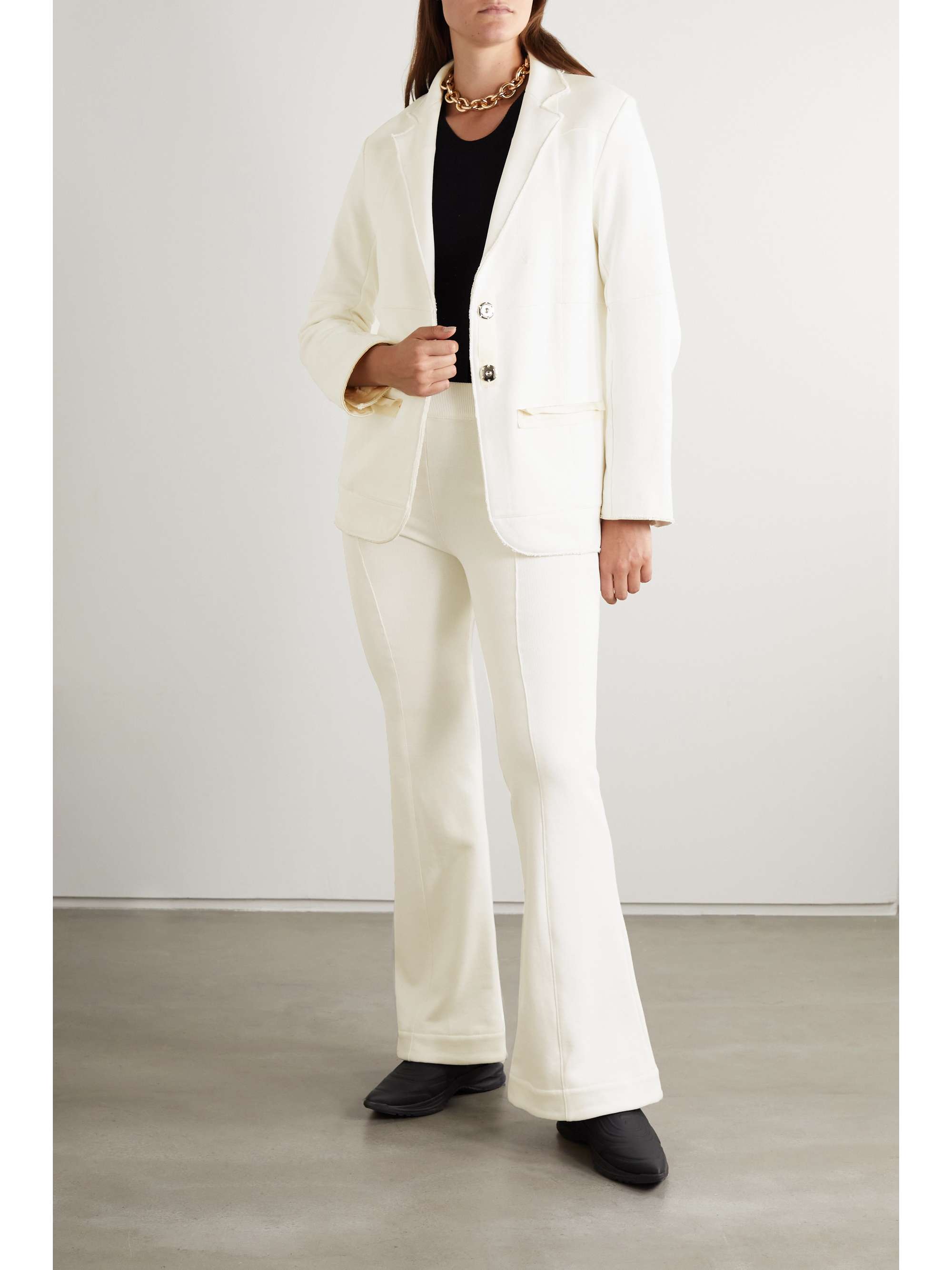 AZ FACTORY Free To organic cotton and SeaCell-blend flared pants