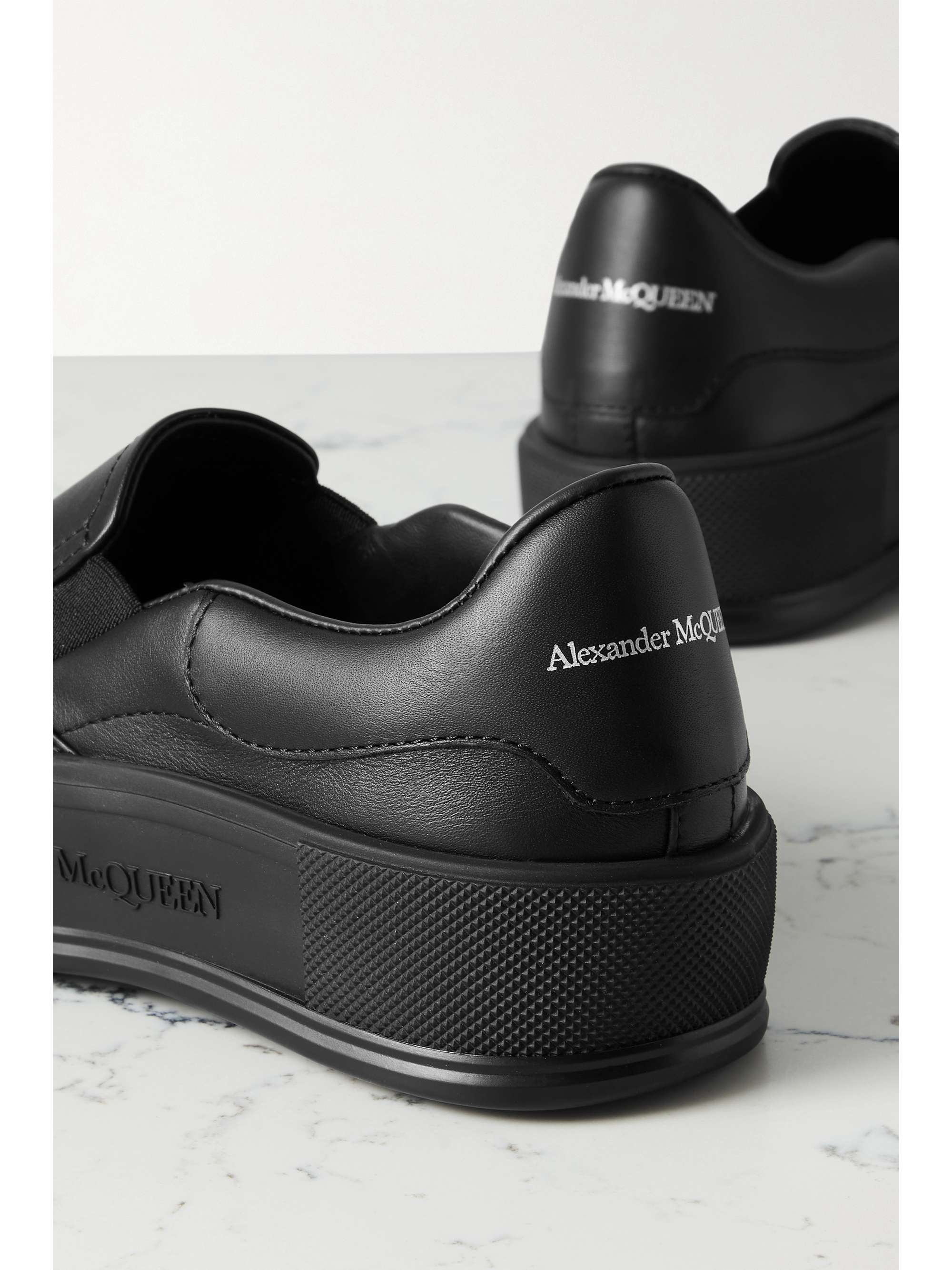 black leather mcqueens