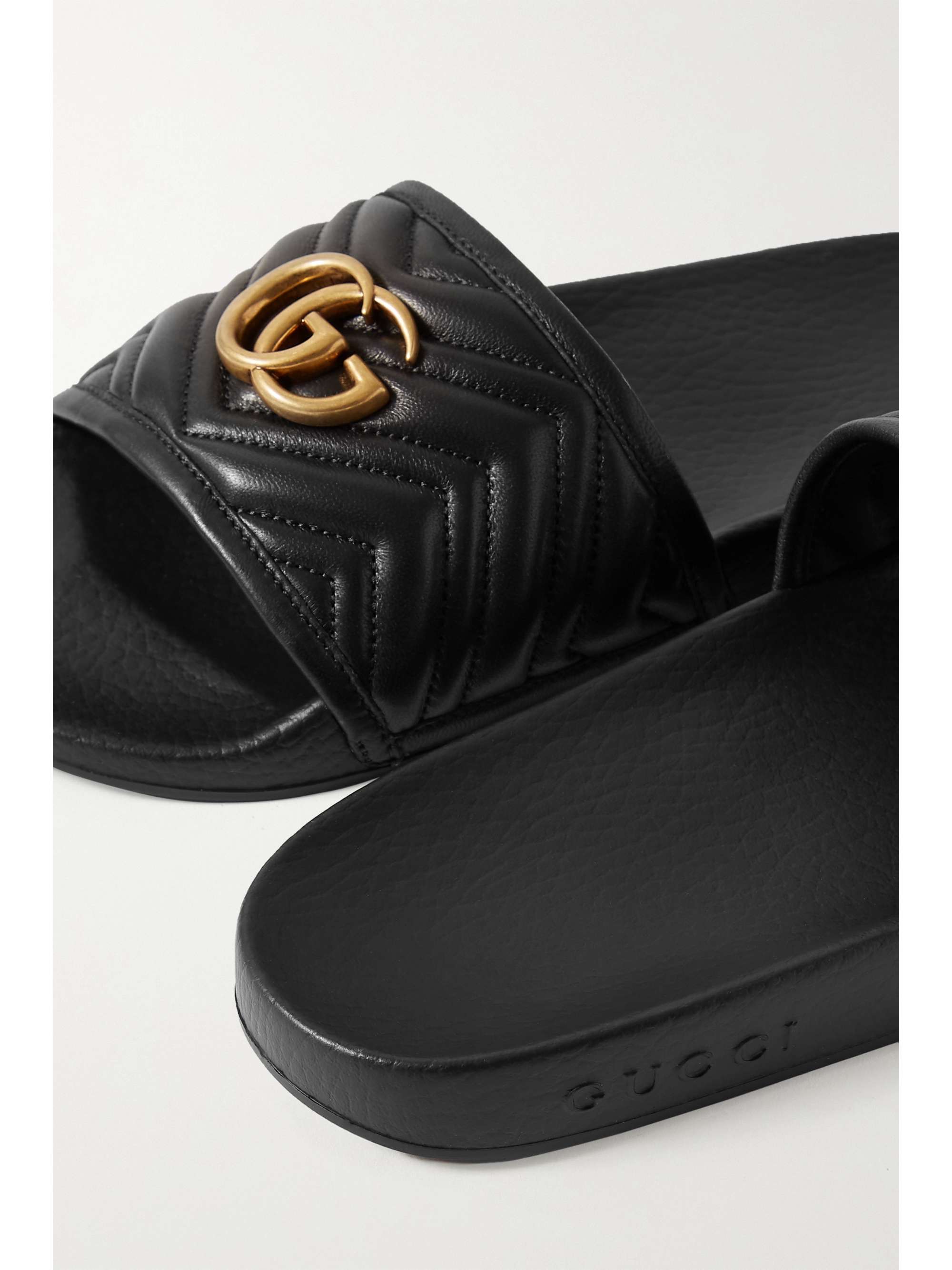 GUCCI Pursuit logo-embossed leather slides