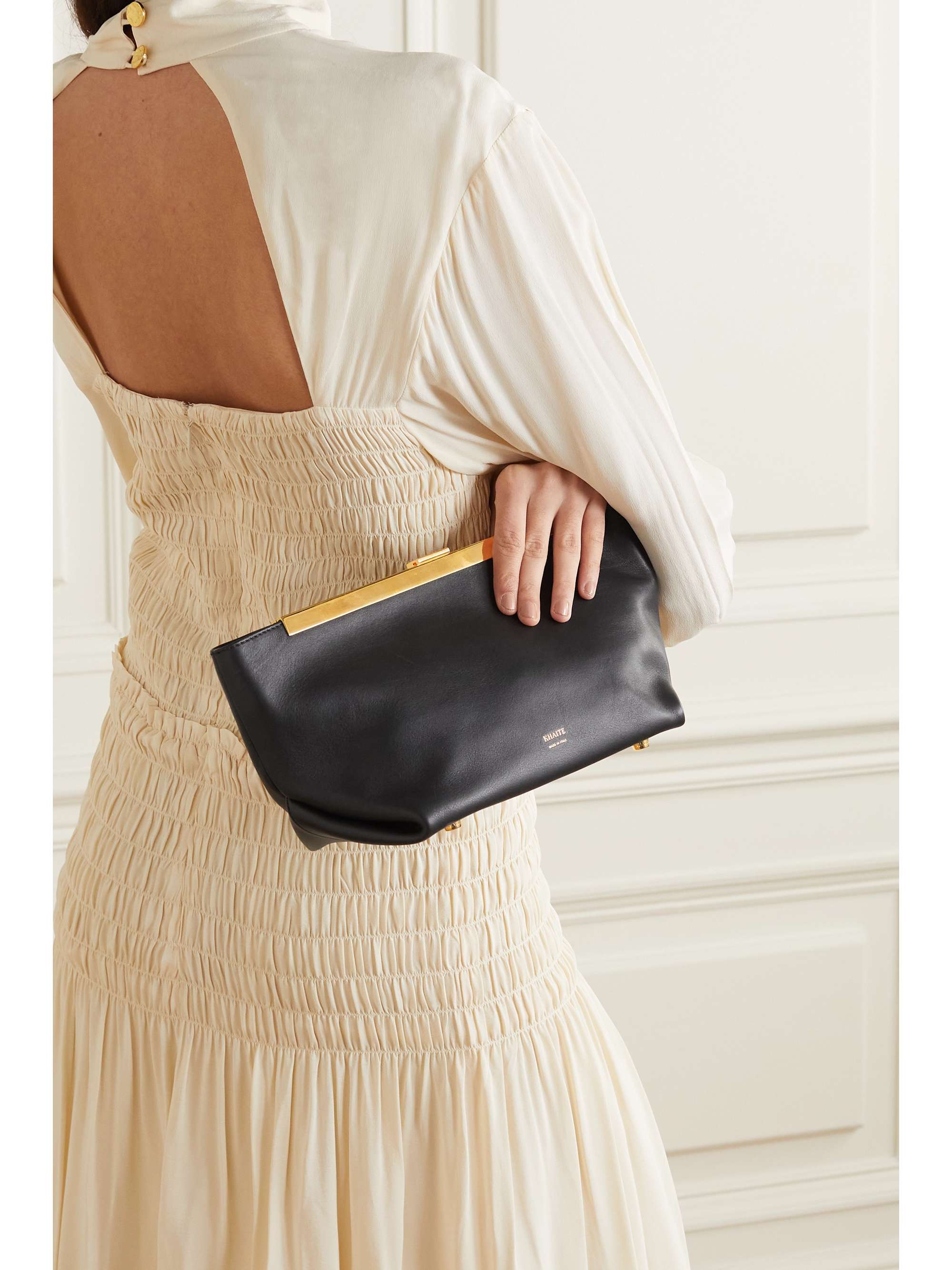 KHAITE Envelope Pleat leather clutch