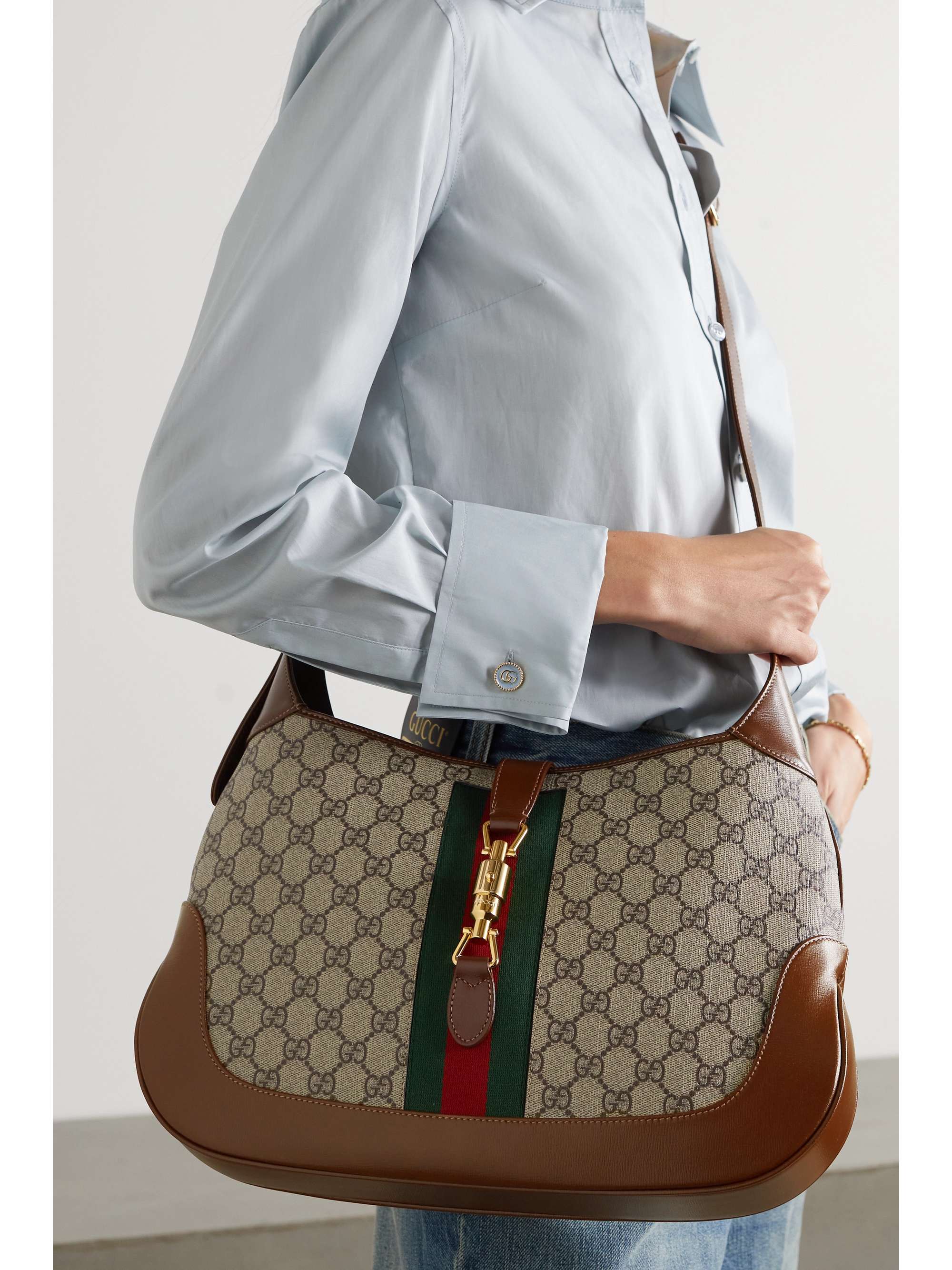 GUCCI Jackie 1961 small webbing-trimmed coated-canvas and leather shoulder  bag in 2023