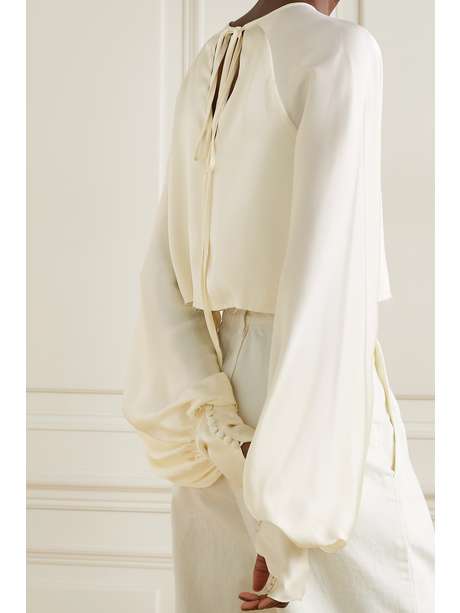 Cream Drama cropped satin blouse | ORSEUND IRIS | NET-A-PORTER