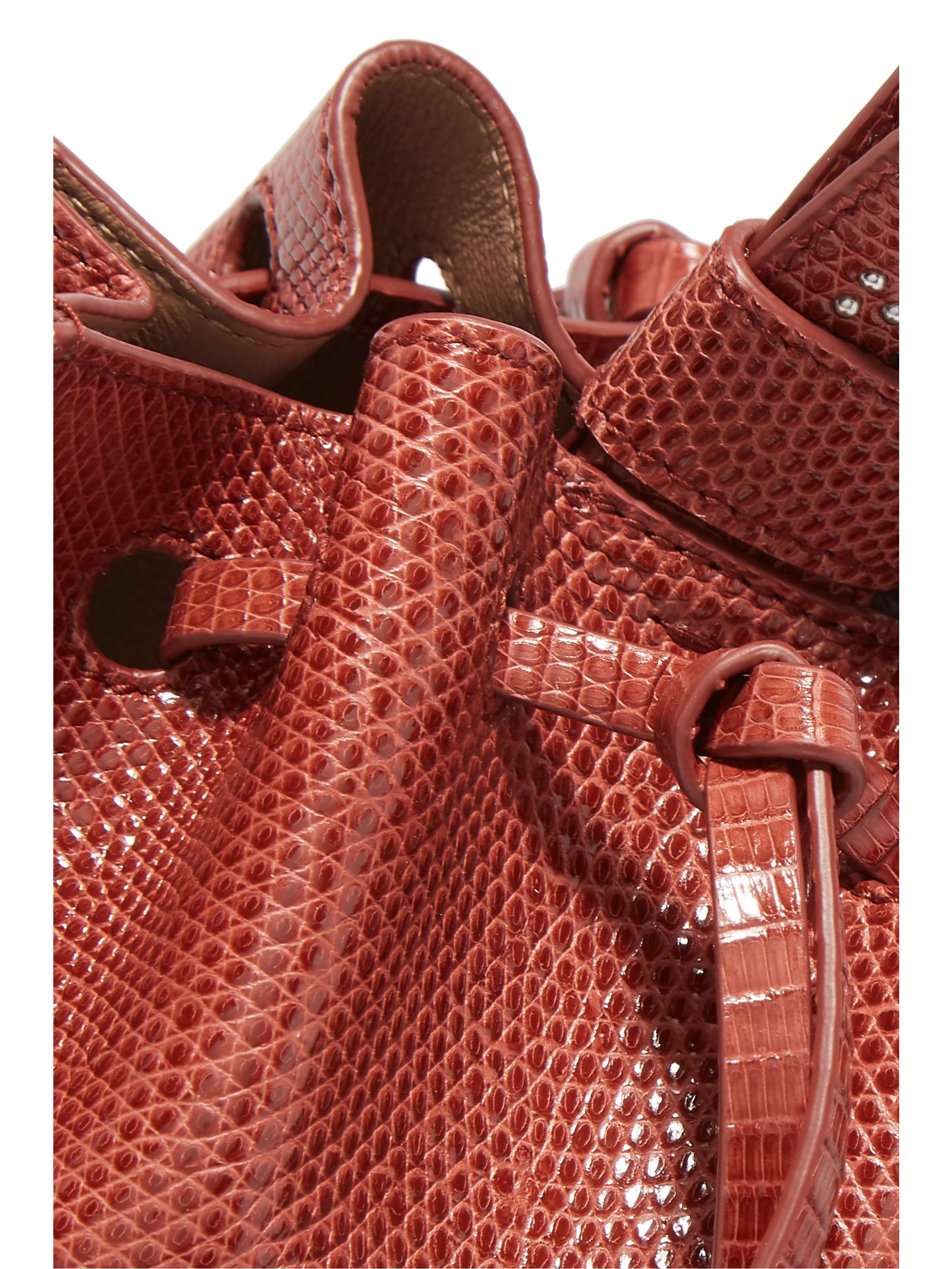 ALAÏA Small studded lizard bucket bag