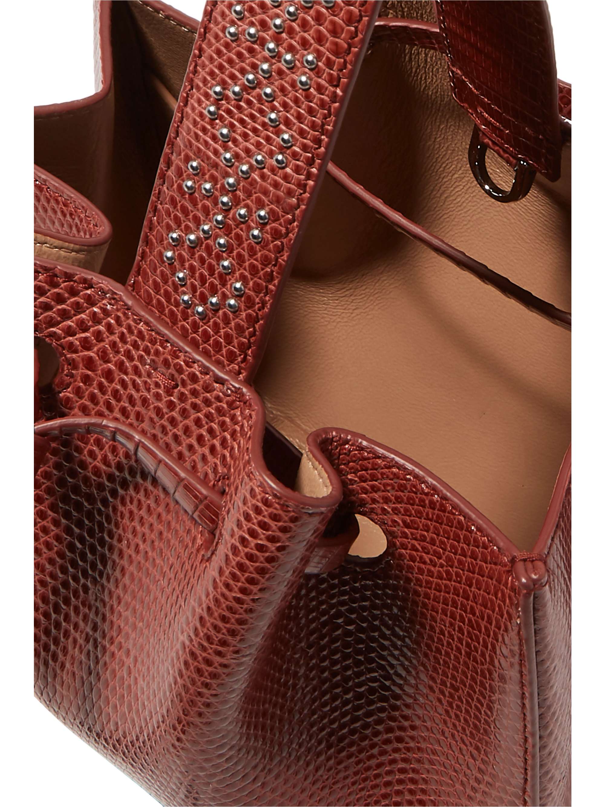 ALAÏA Small studded lizard bucket bag