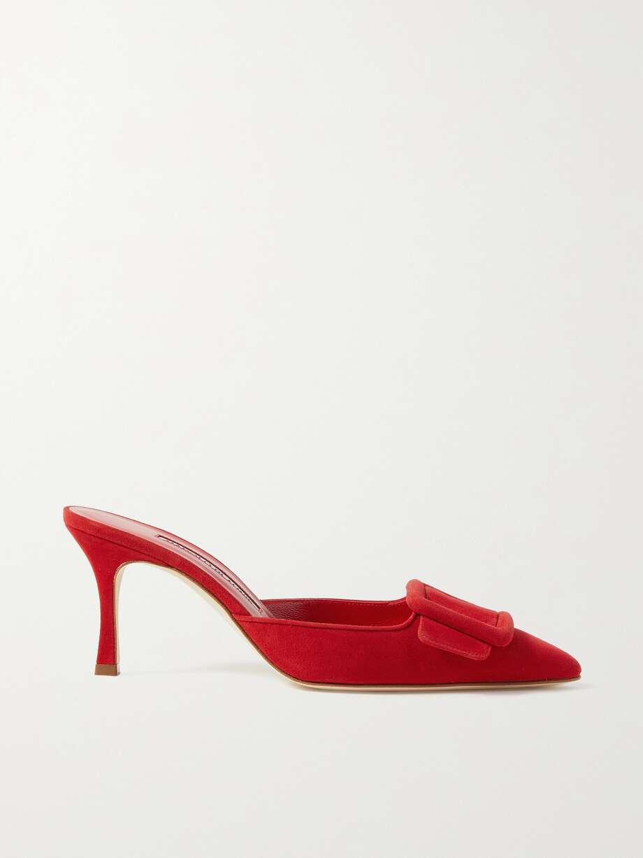 spring 2024 shoe trends  - Manolo Blahnik debuted his iconic 'Maysale' mules in Isaac Mizrahi's Spring '91 runway collection and they've been loved for the signature buckle topper ever since. This vibrant red pair has been crafted by artisans in Italy from soft suede and set on a gently fluted 70mm kitten heel. They're lined and soled with smooth leather for extra comfort.