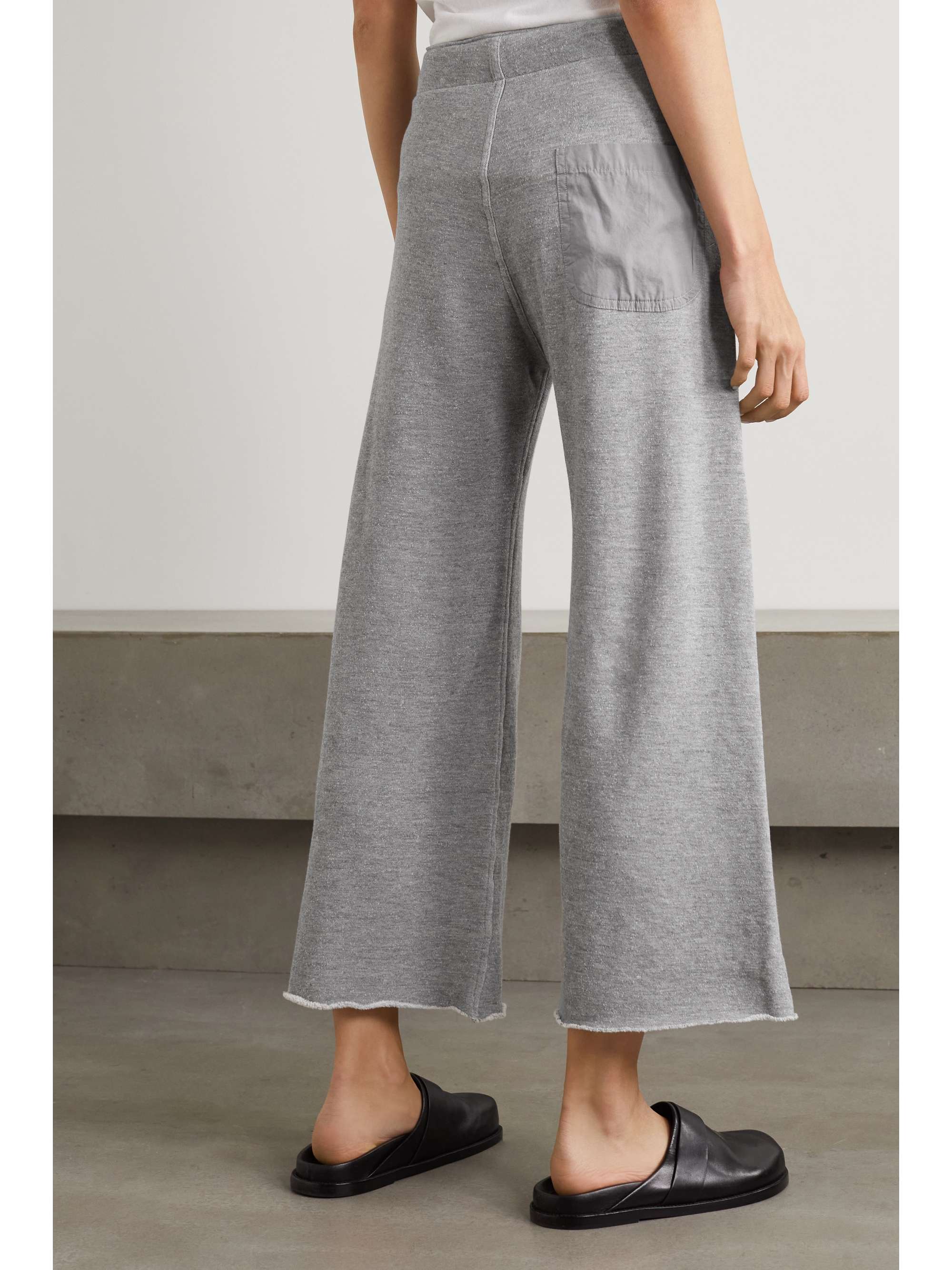 NILI LOTAN Kiki cropped distressed cotton-blend jersey track pants