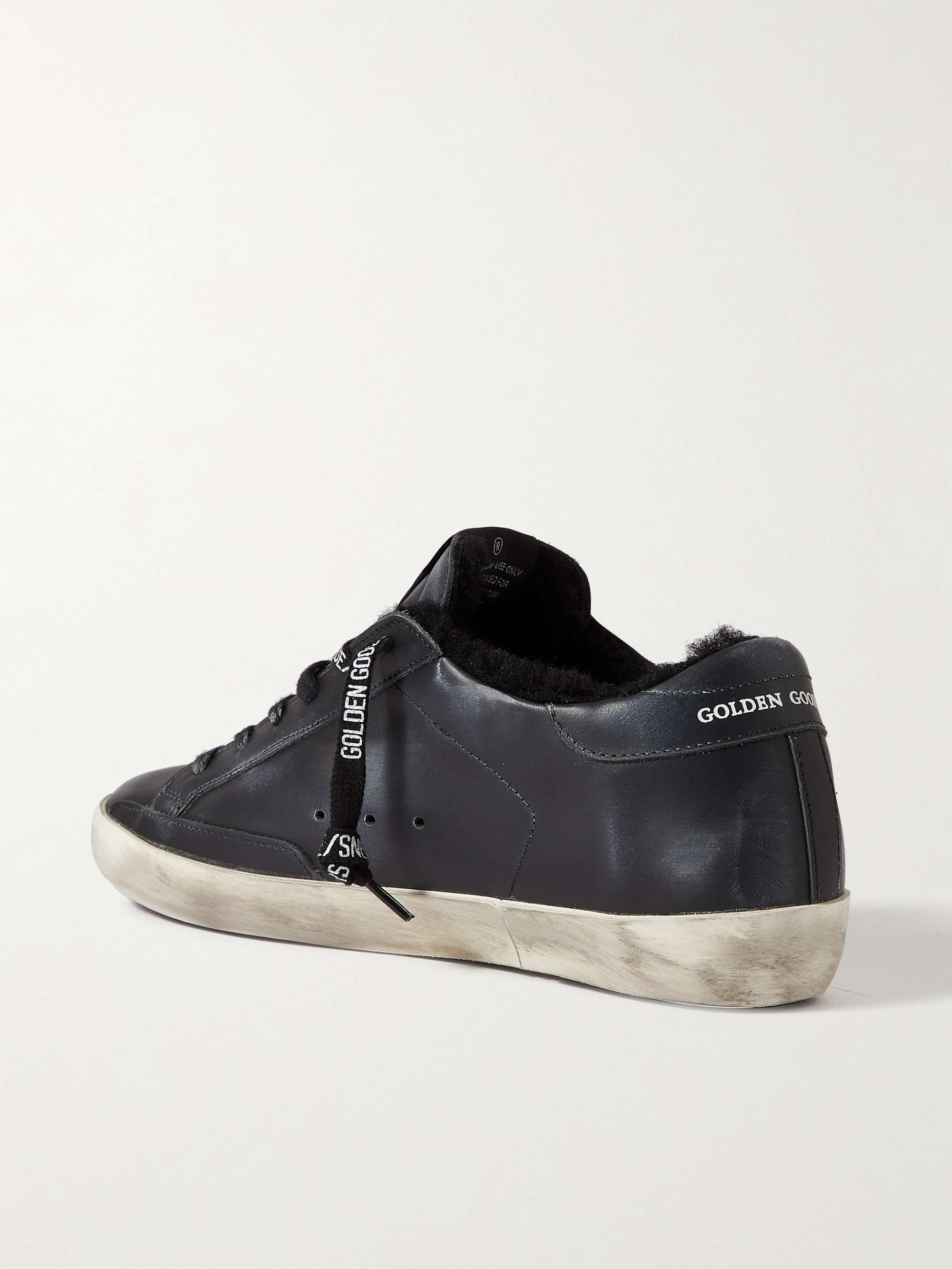 GOLDEN GOOSE Superstar shearling-lined distressed leather sneakers