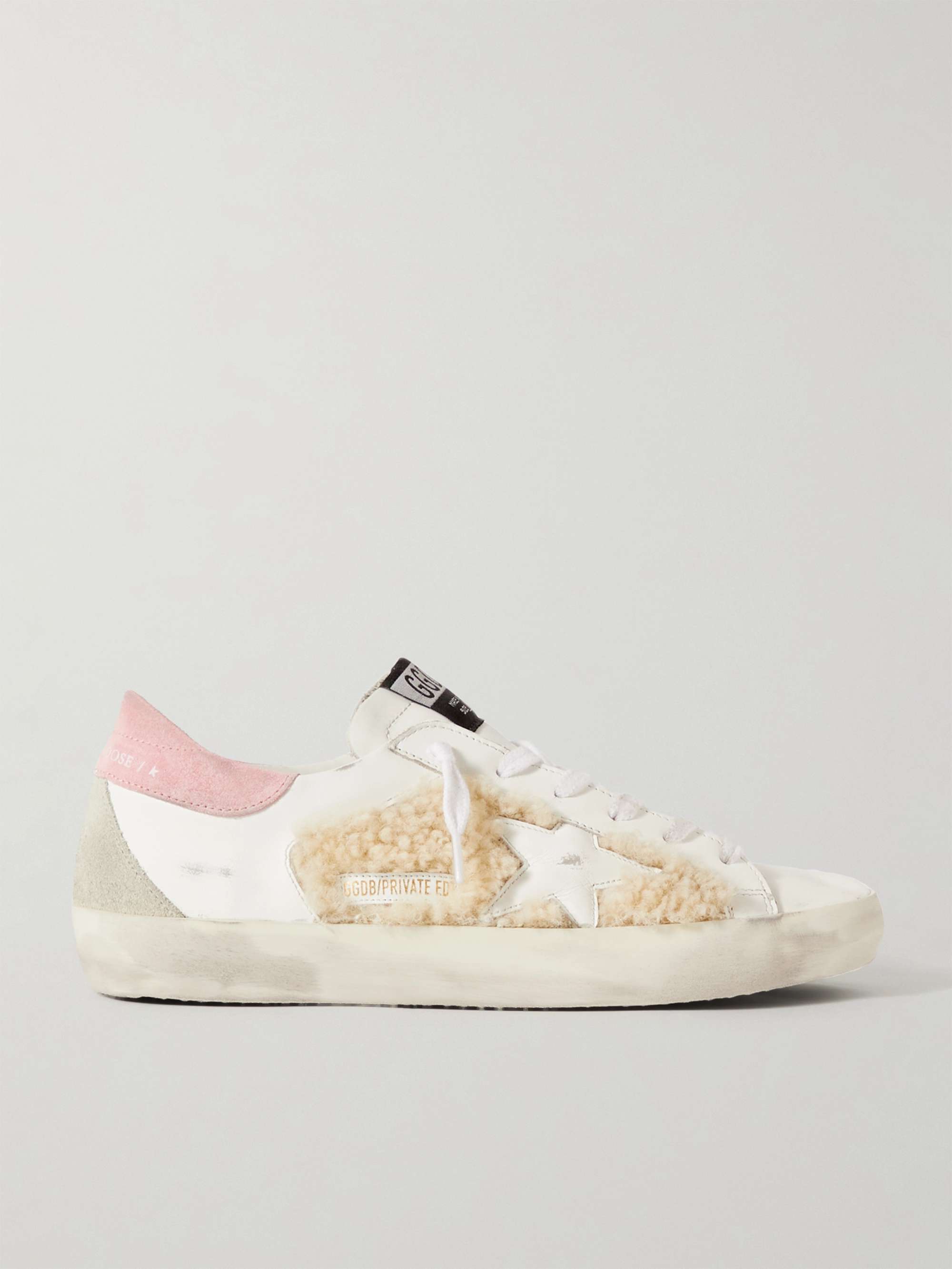 Superstar shearling trimmed distressed leather and suede sneakers