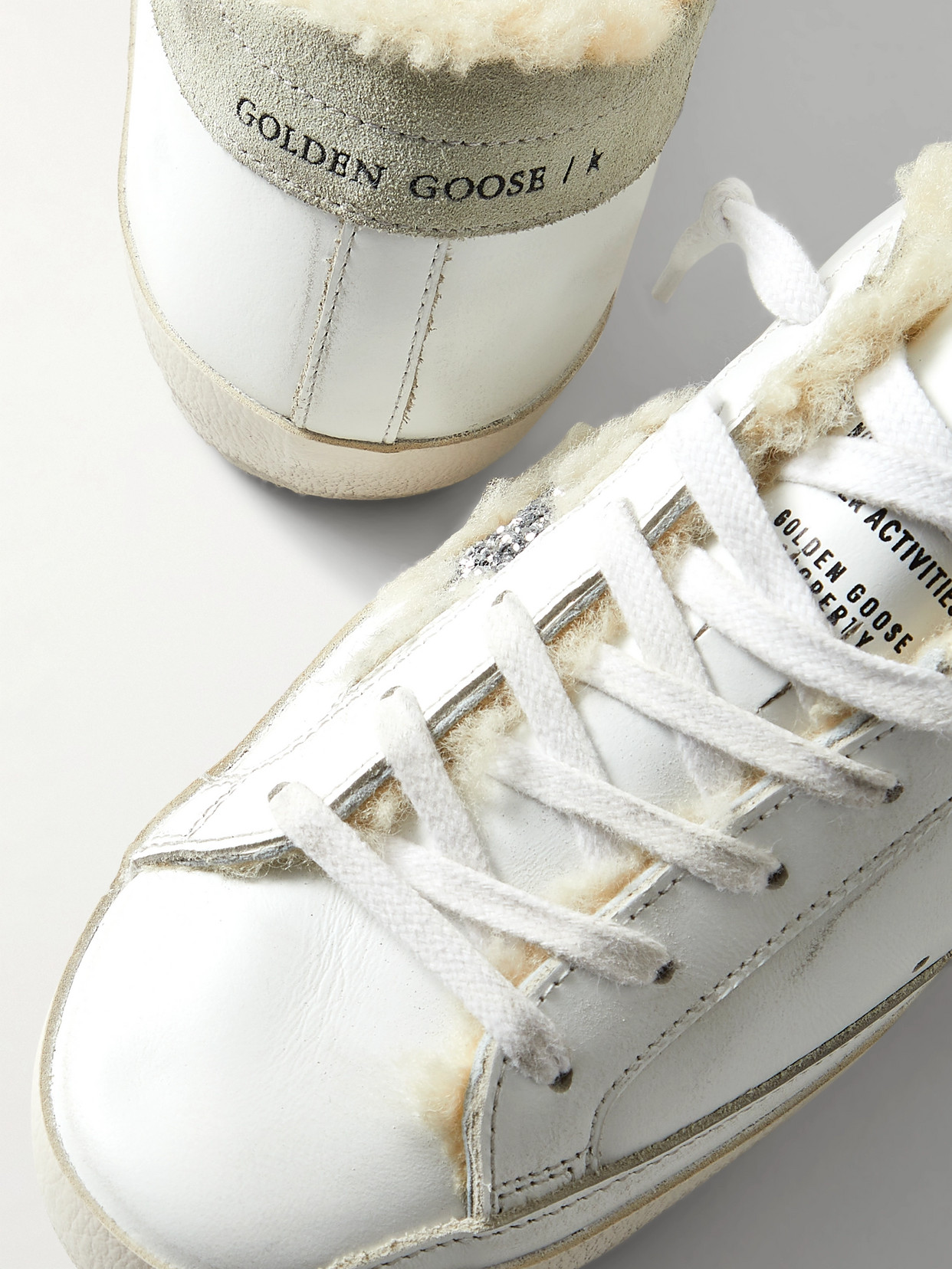 Shop Golden Goose Superstar Shearling-lined Distressed Glittered Leather Sneakers In White