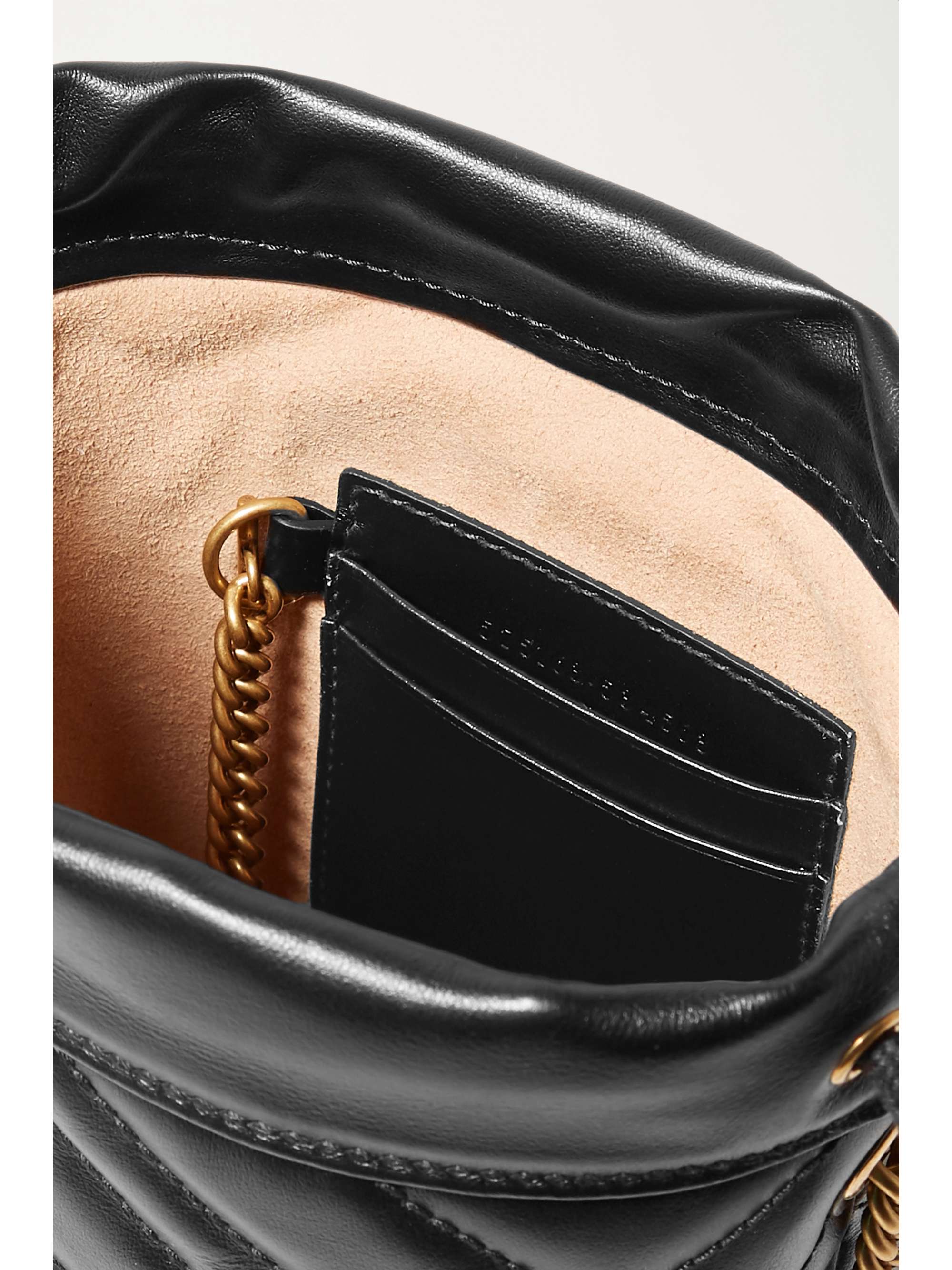 GUCCI GG Marmont mini quilted leather bucket bag  Bucket bag, Leather  crossbody bag, Black leather crossbody bag