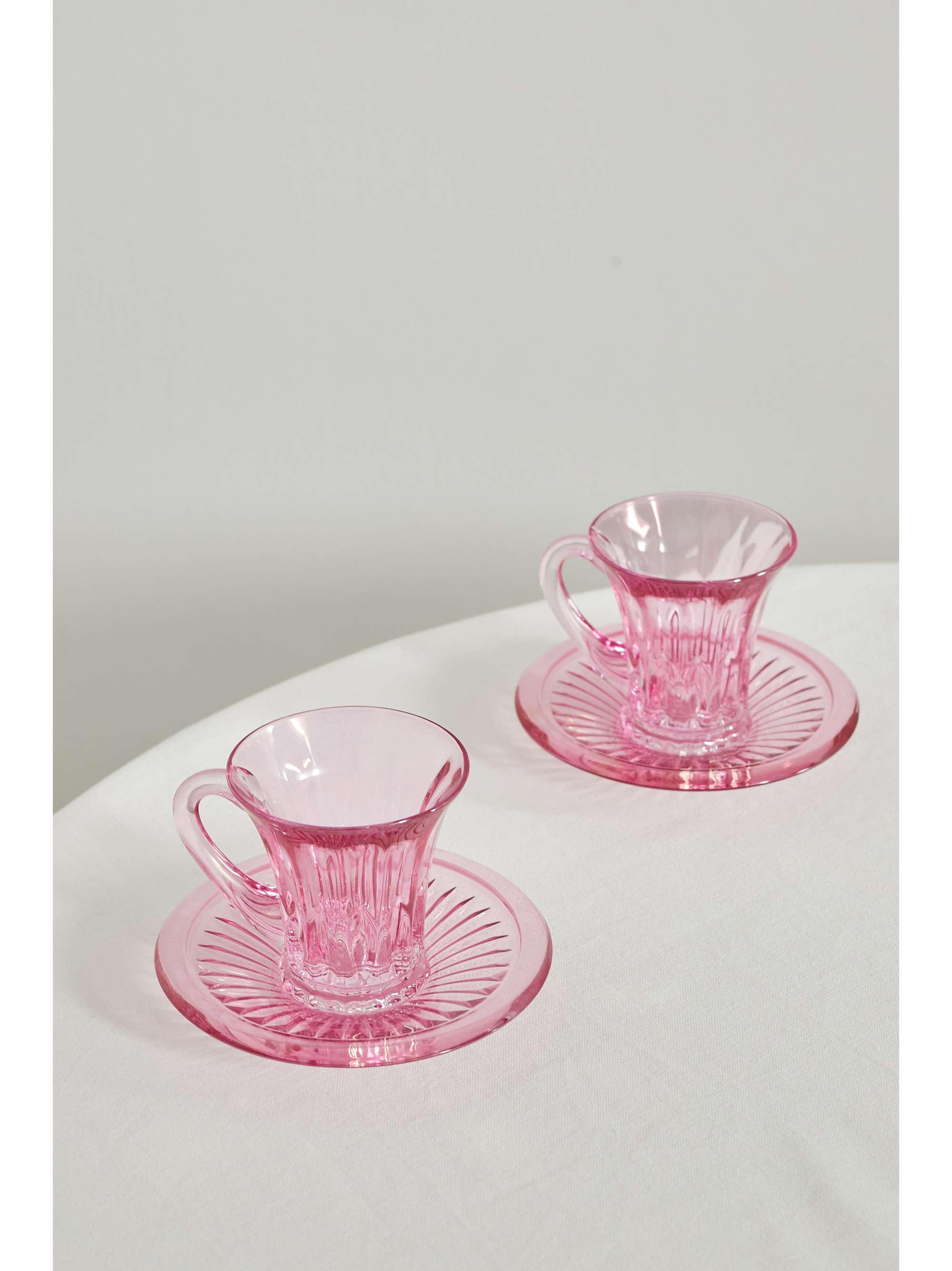 LUISA BECCARIA Set of two iridescent glass tea cups and saucers