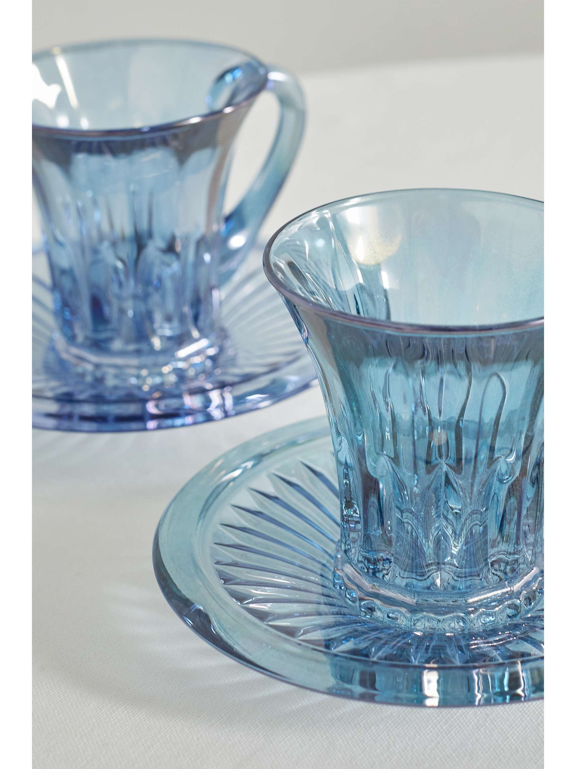 LUISA BECCARIA Set of two iridescent glass tea cups and saucers