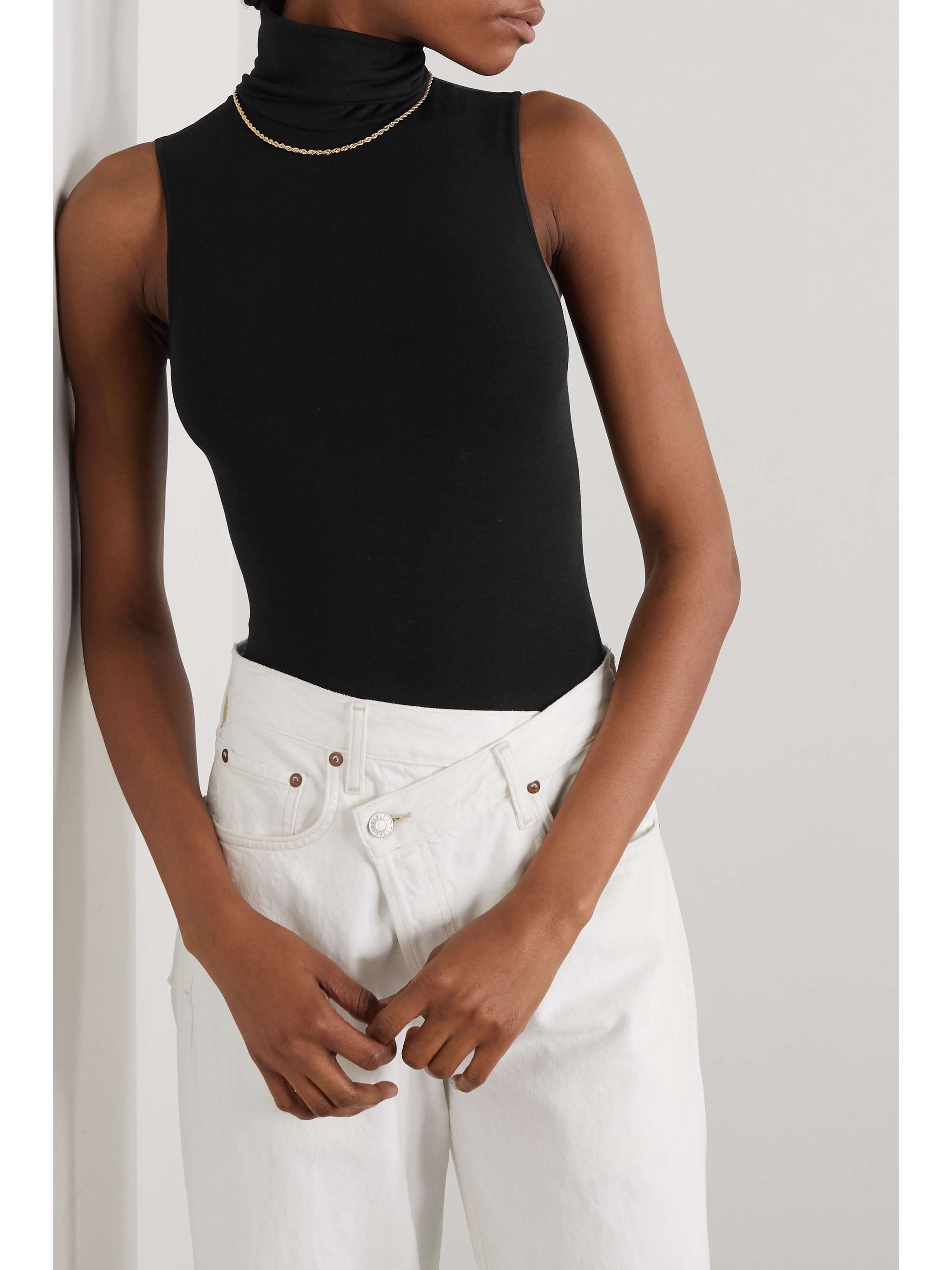 WOLFORD Stretch modal blend turtleneck thong bodysuit NET A PORTER