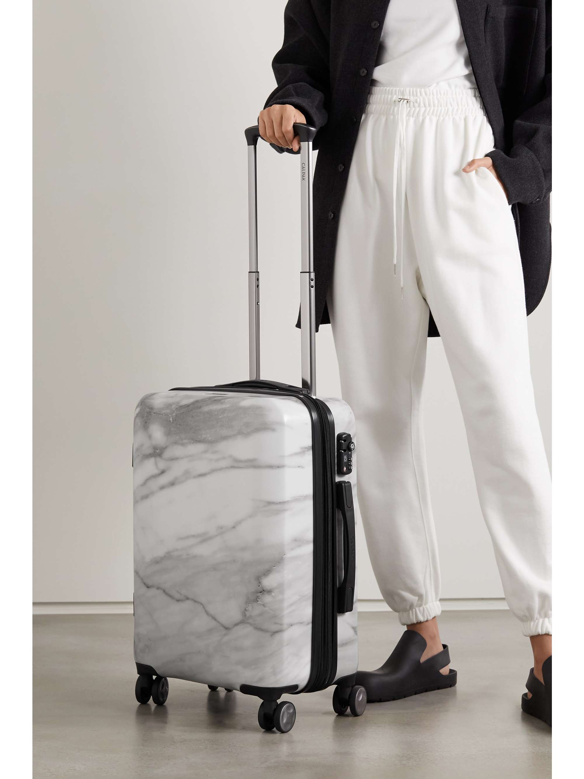 CALPAK Astyll Carry-On marbled hardshell suitcase