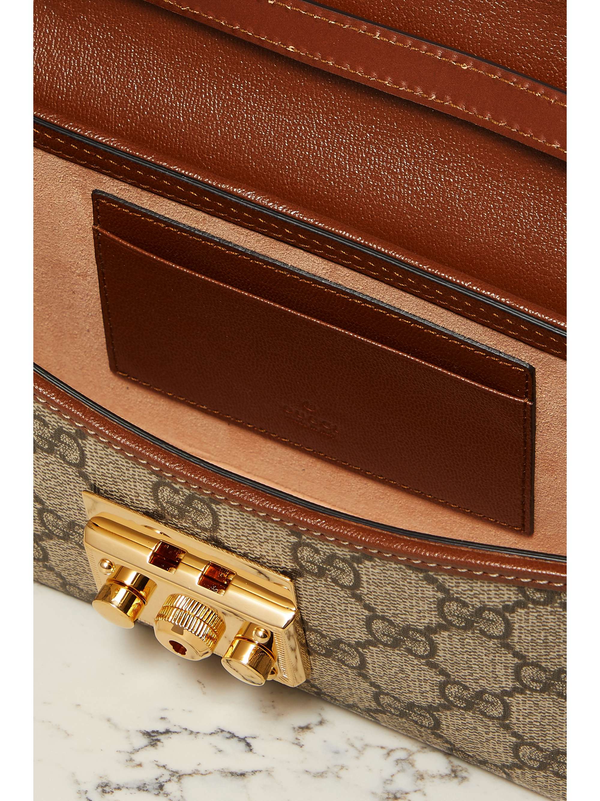 GUCCI Sac à main en toile enduite imprimée et en cuir Padlock