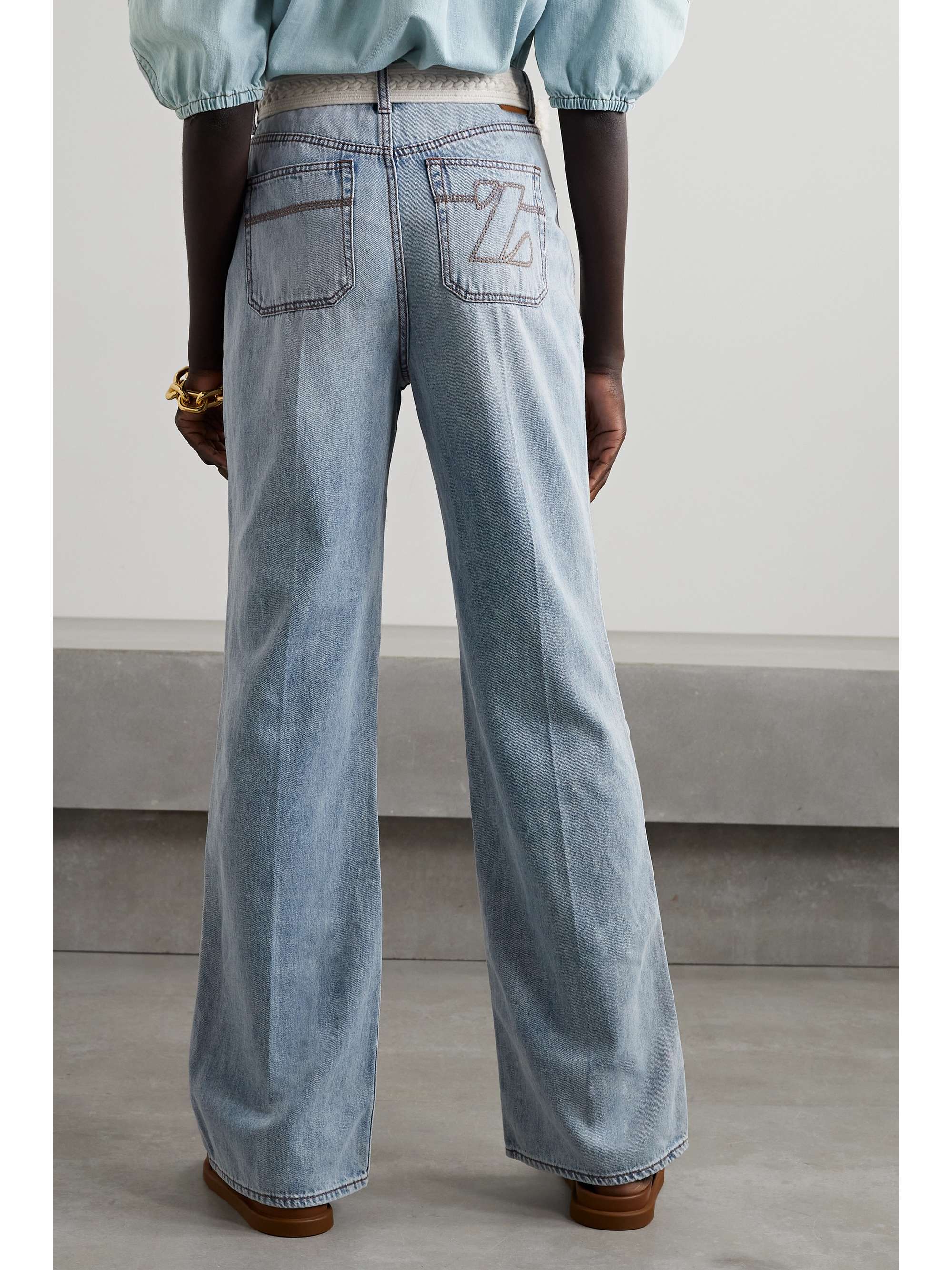 ZIMMERMANN Andie belted high-rise flared jeans