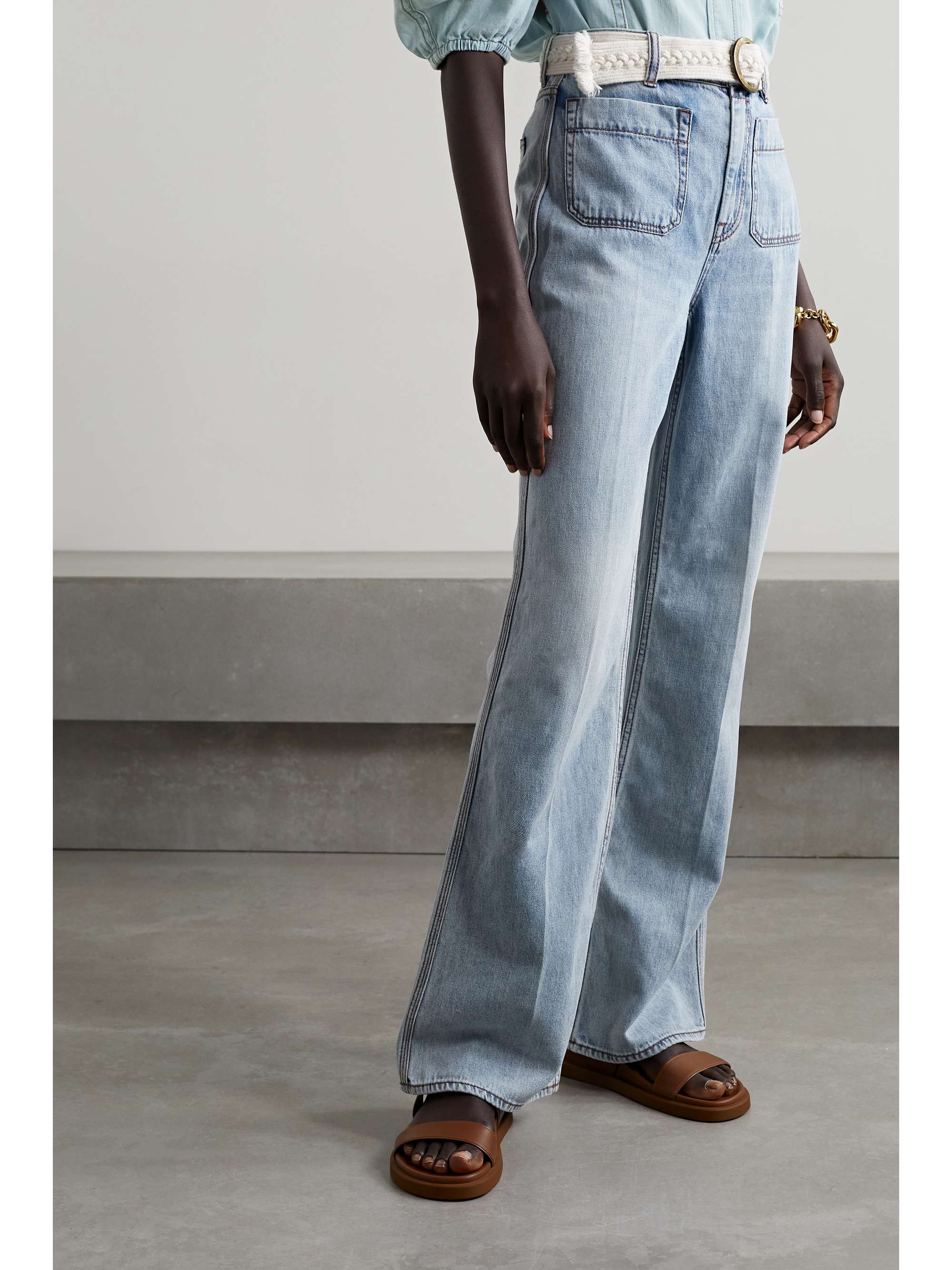 ZIMMERMANN Andie belted high-rise flared jeans