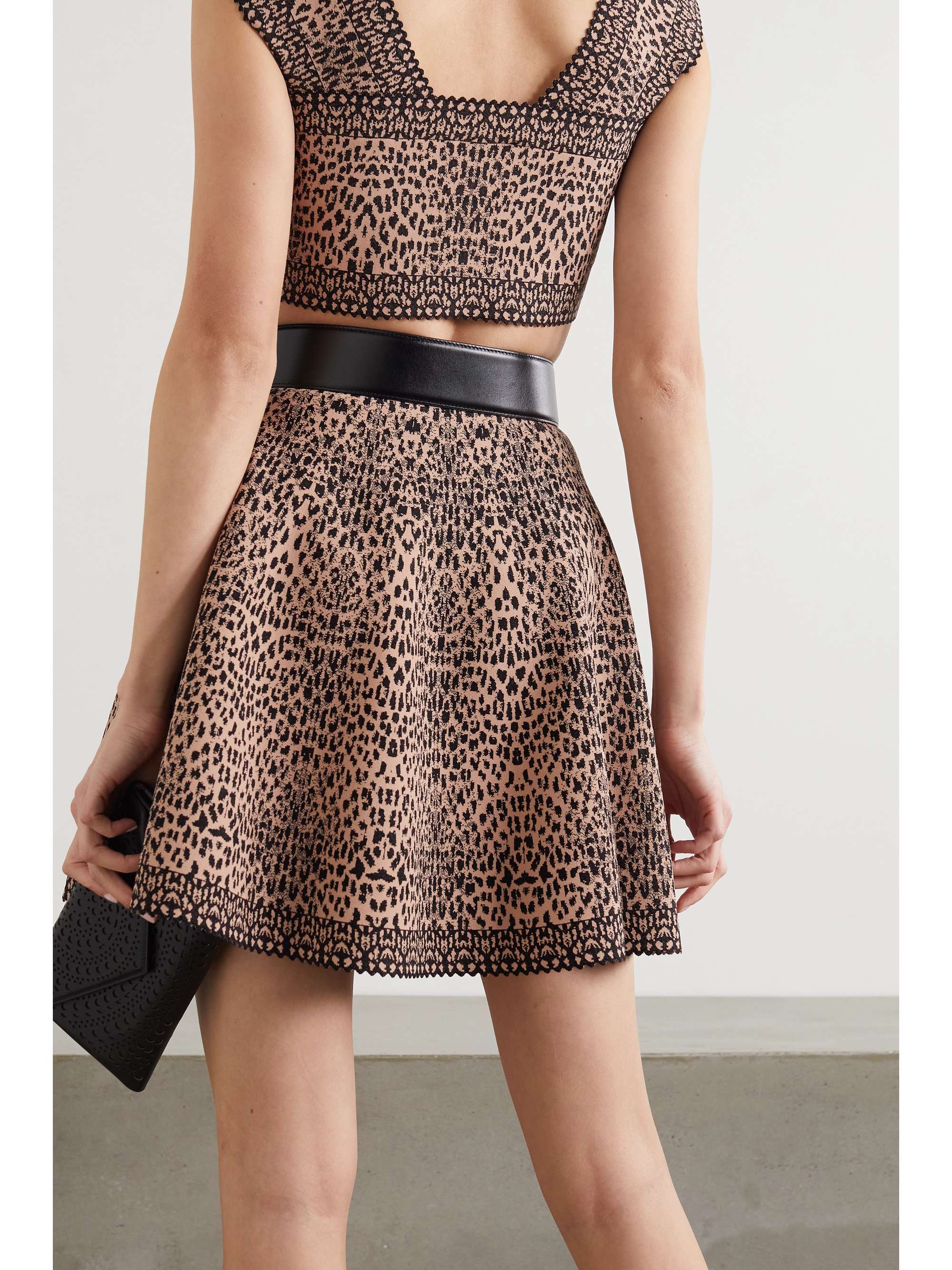 ALAÏA Pleated jacquard-knit mini skirt