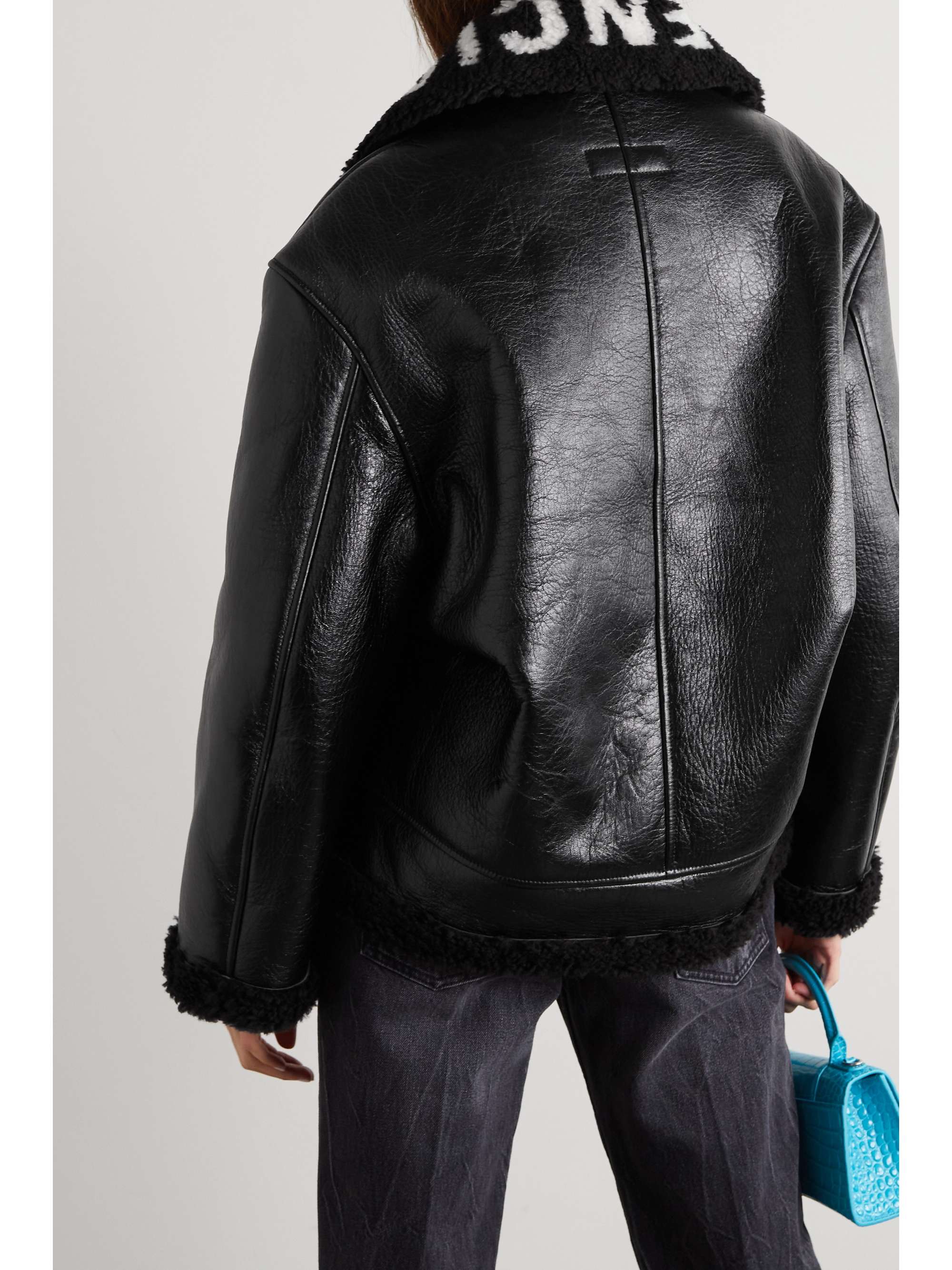 BALENCIAGA Cropped faux shearling-lined leather jacket