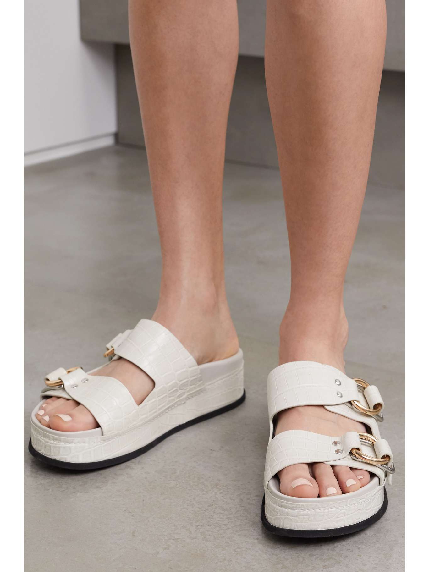 black dress and red shoes outfit