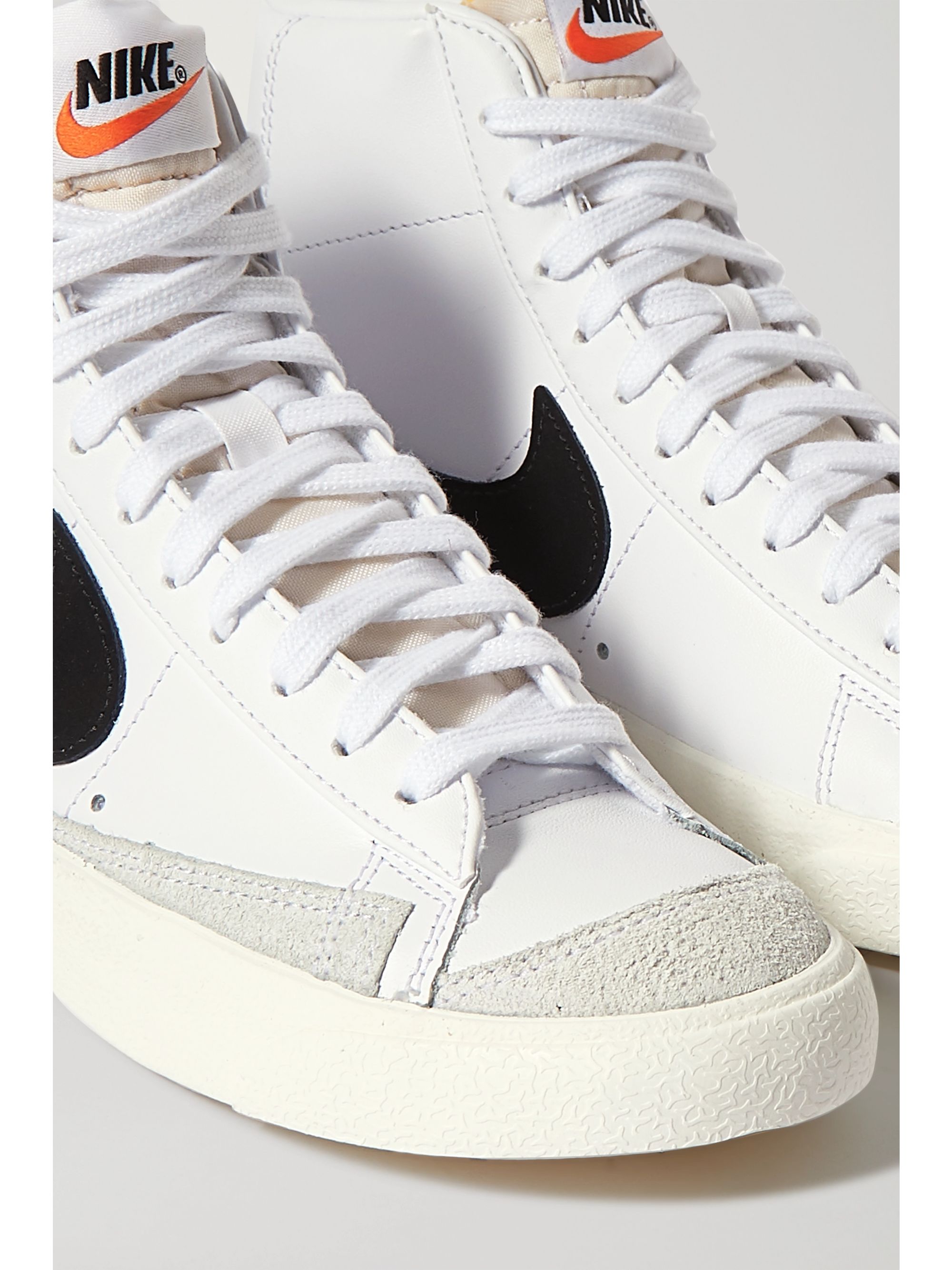 white leather high top sneakers