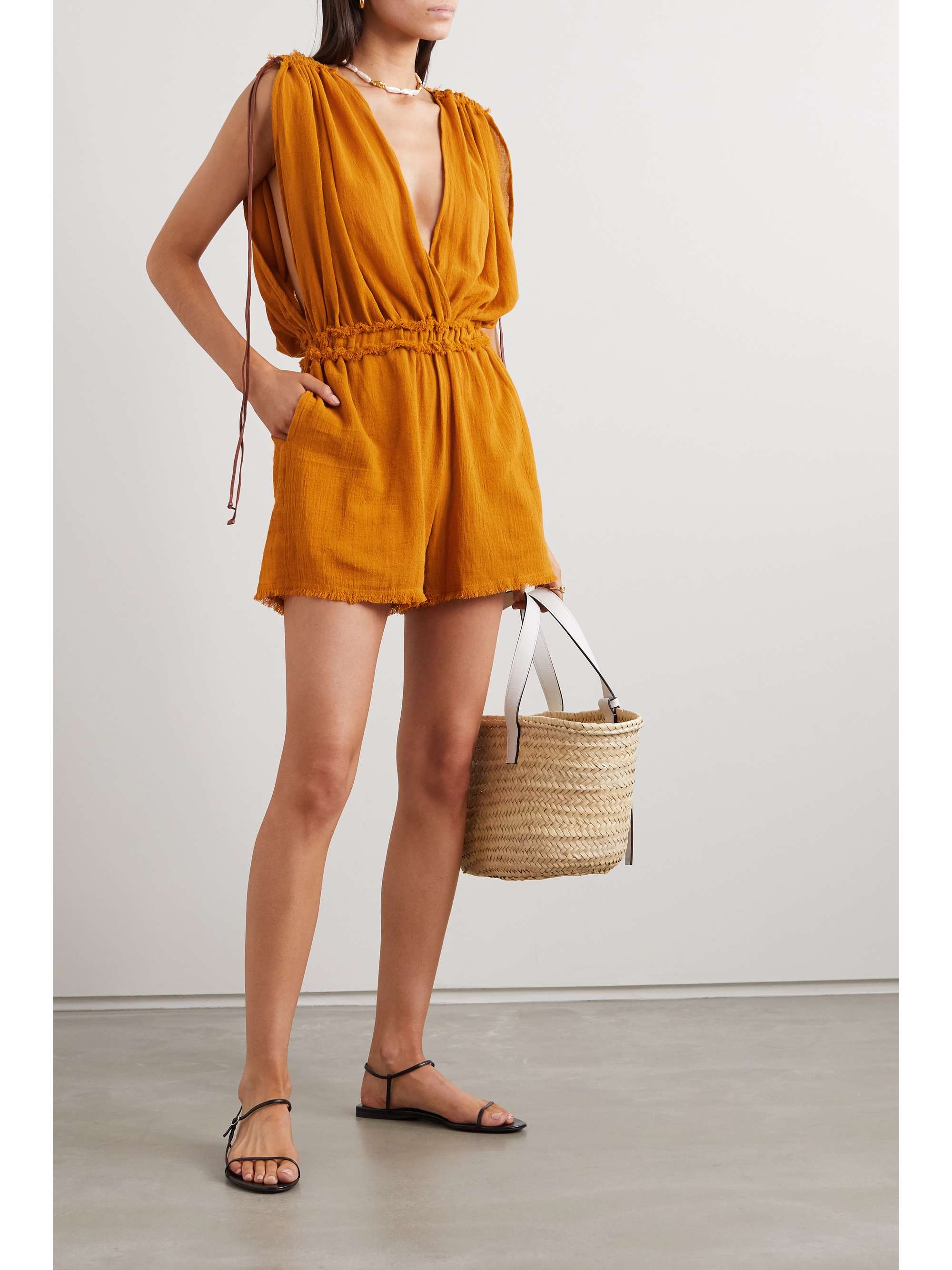CARAVANA + NET SUSTAIN Kaayche leather-trimmed frayed cotton-gauze playsuit