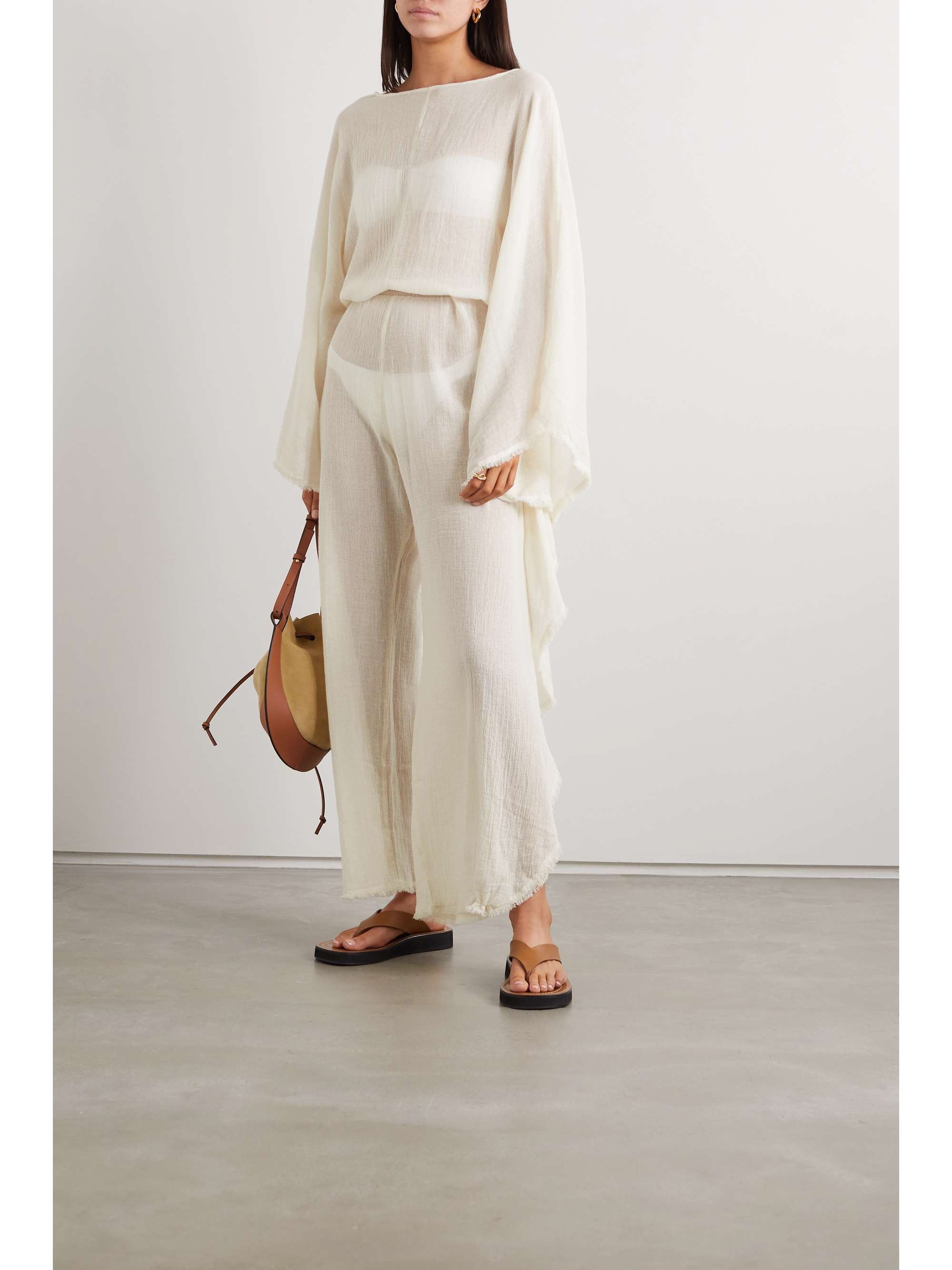 CARAVANA + NET SUSTAIN open-back leather-trimmed cotton-gauze jumpsuit
