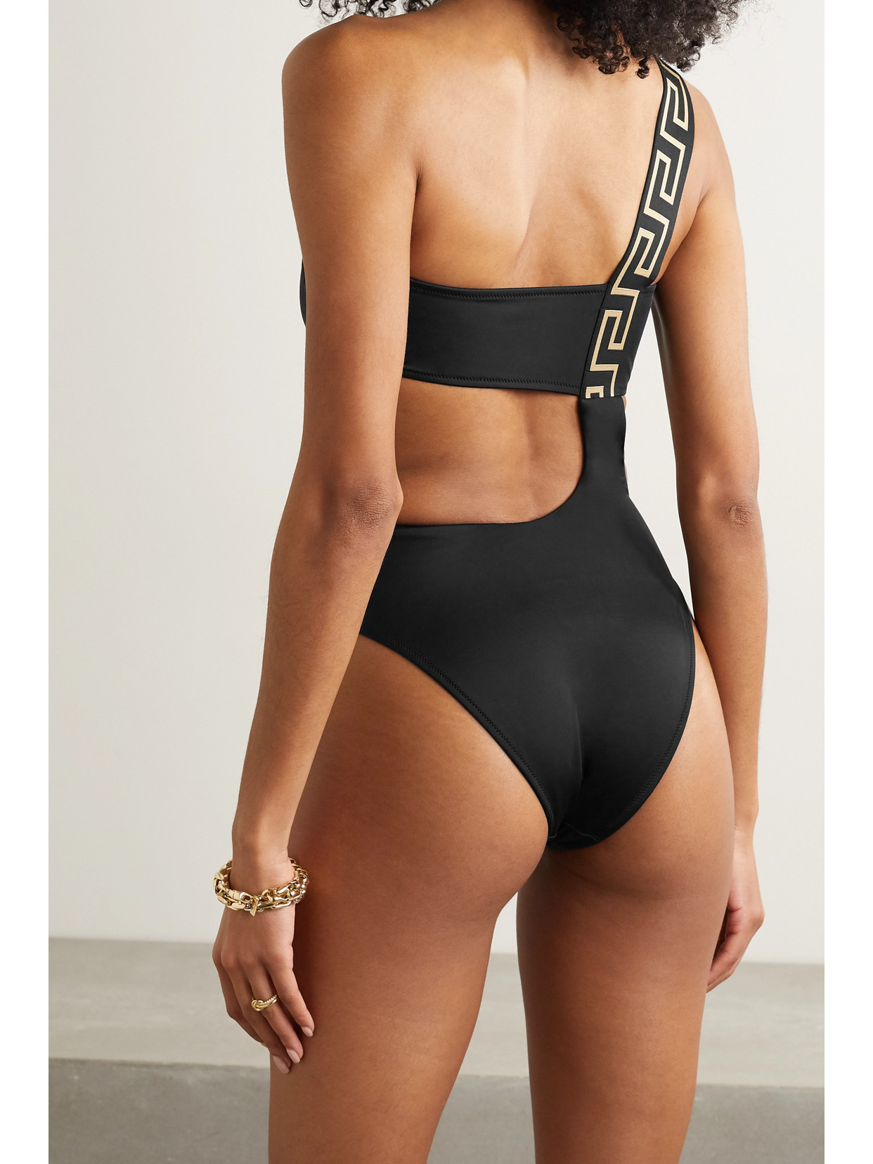 Shop Versace One-shoulder Cutout Swimsuit In Black