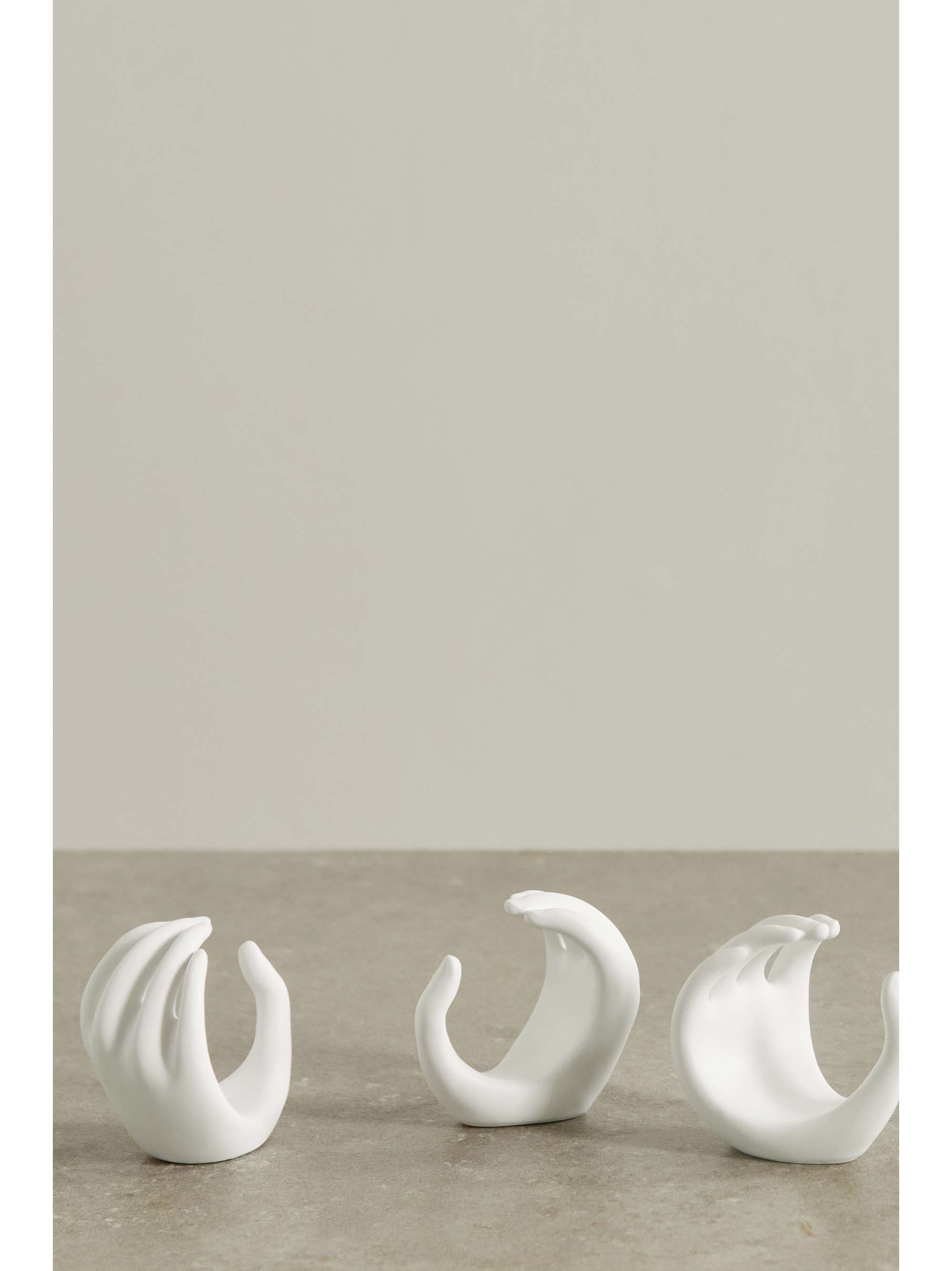 ANISSA KERMICHE Hands set of three earthenware napkin rings