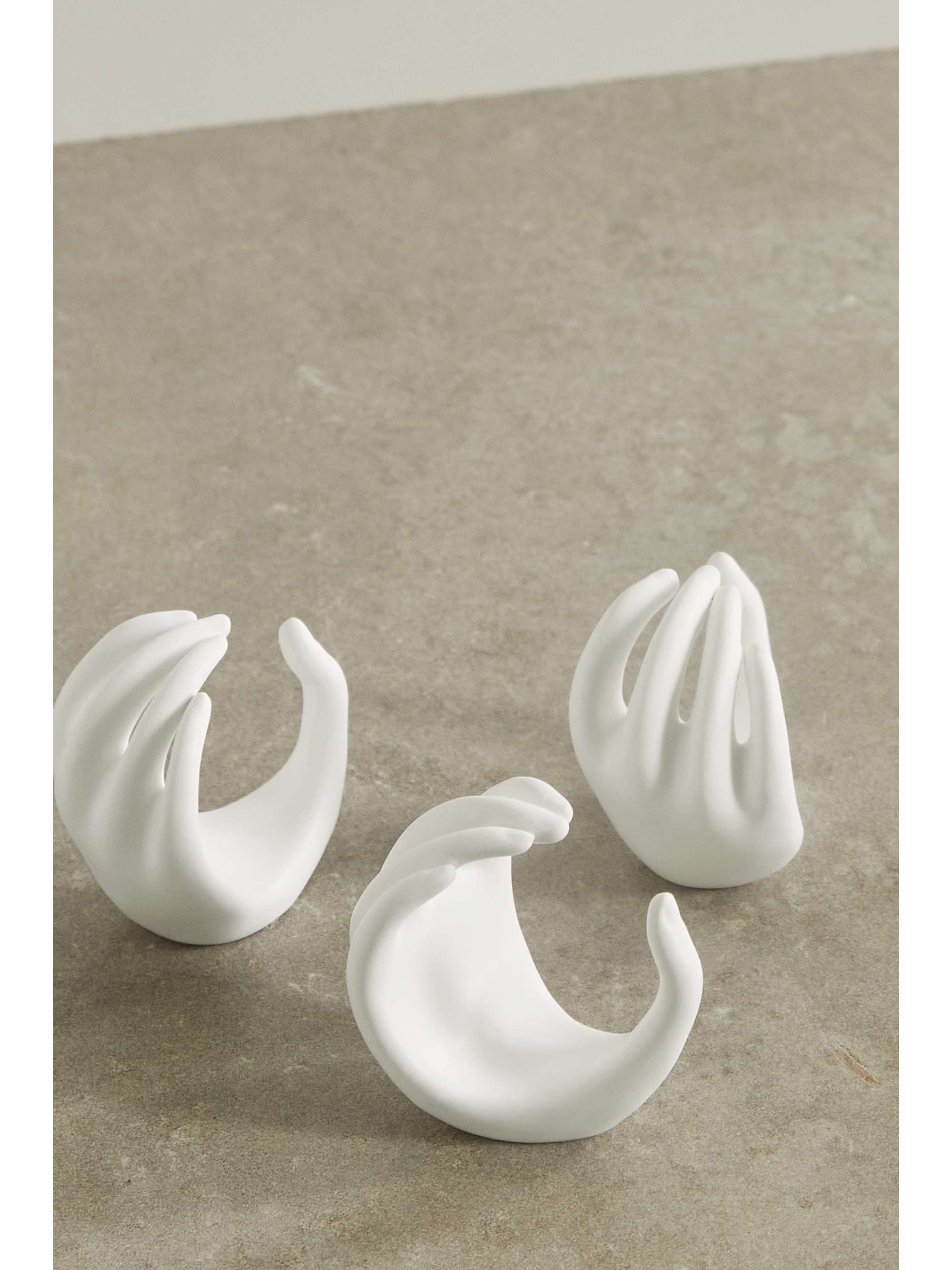 ANISSA KERMICHE Hands set of three earthenware napkin rings