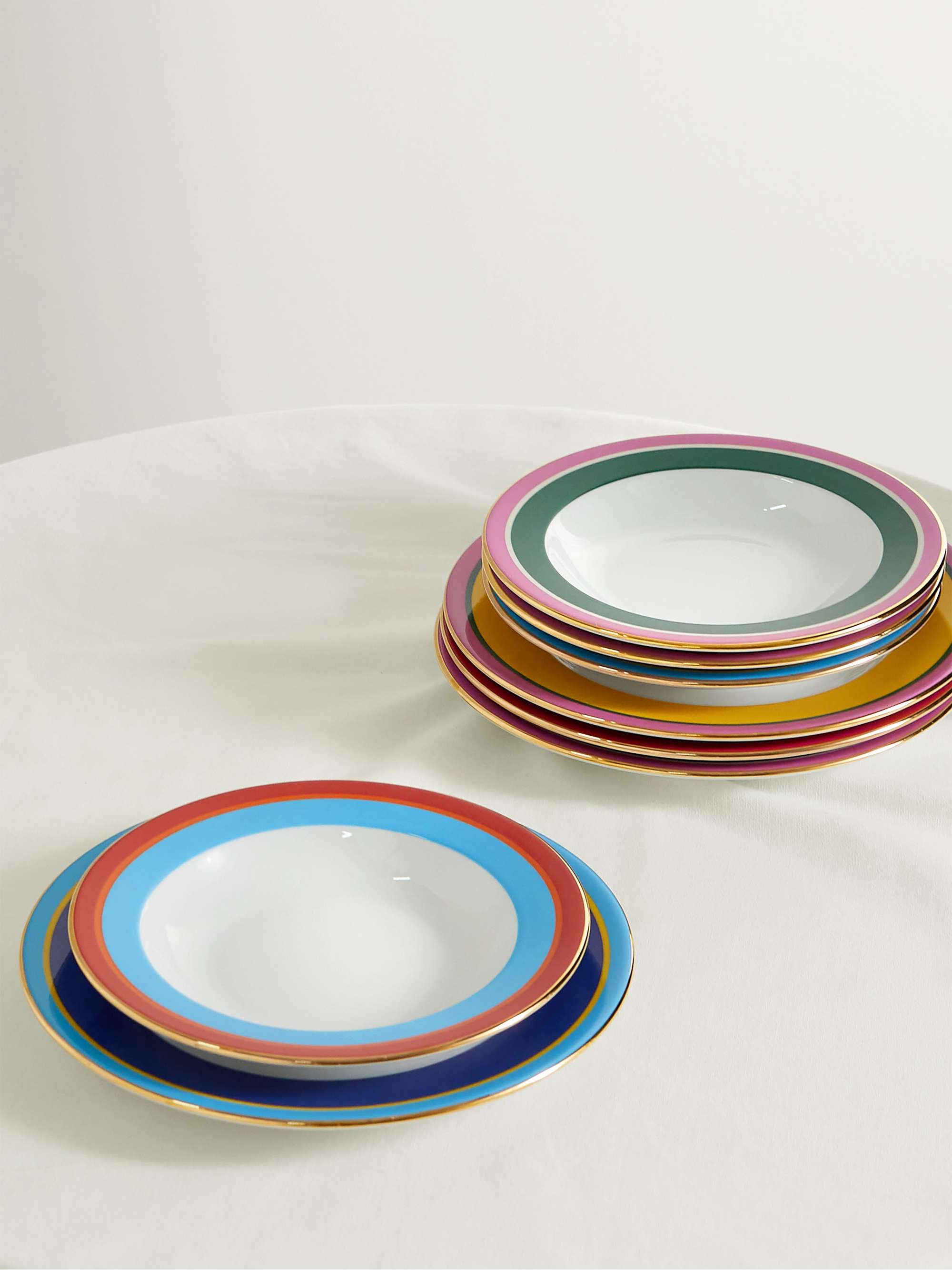 LA DOUBLEJ Set of eight gold-plated porcelain soup bowls and dinner plates