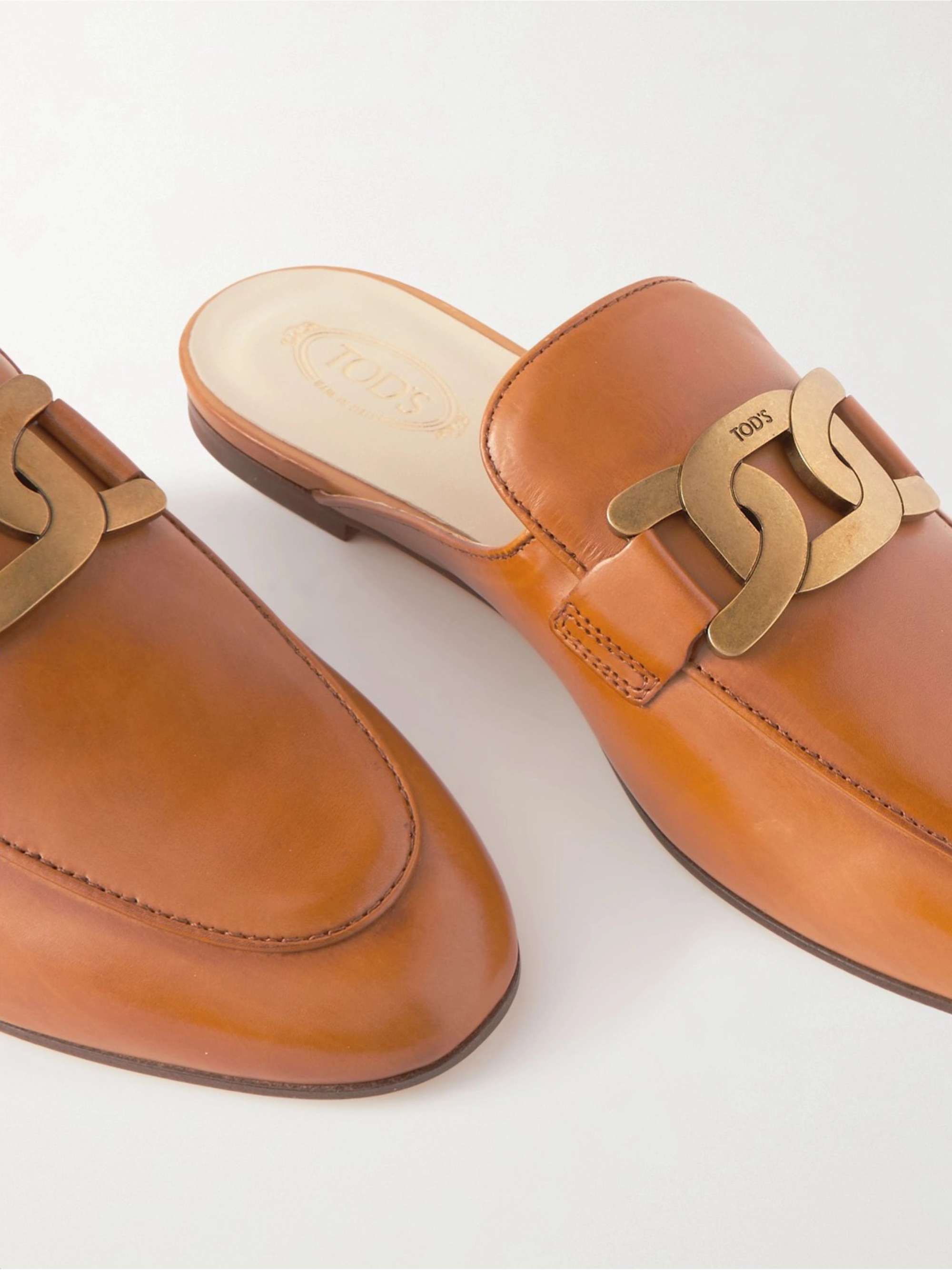 TOD'S Embellished leather slippers