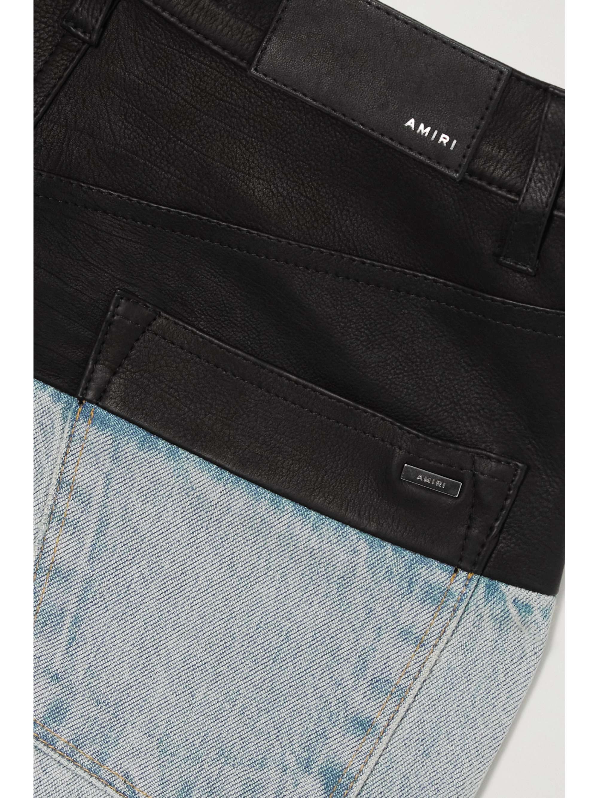 AMIRI Leather-paneled distressed denim high-rise slim-leg jeans