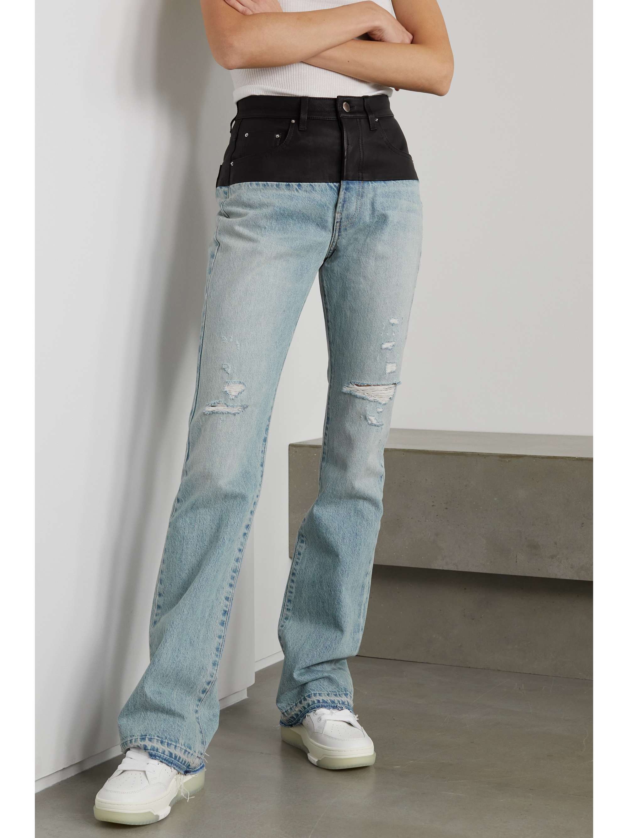 AMIRI Leather-paneled distressed denim high-rise slim-leg jeans