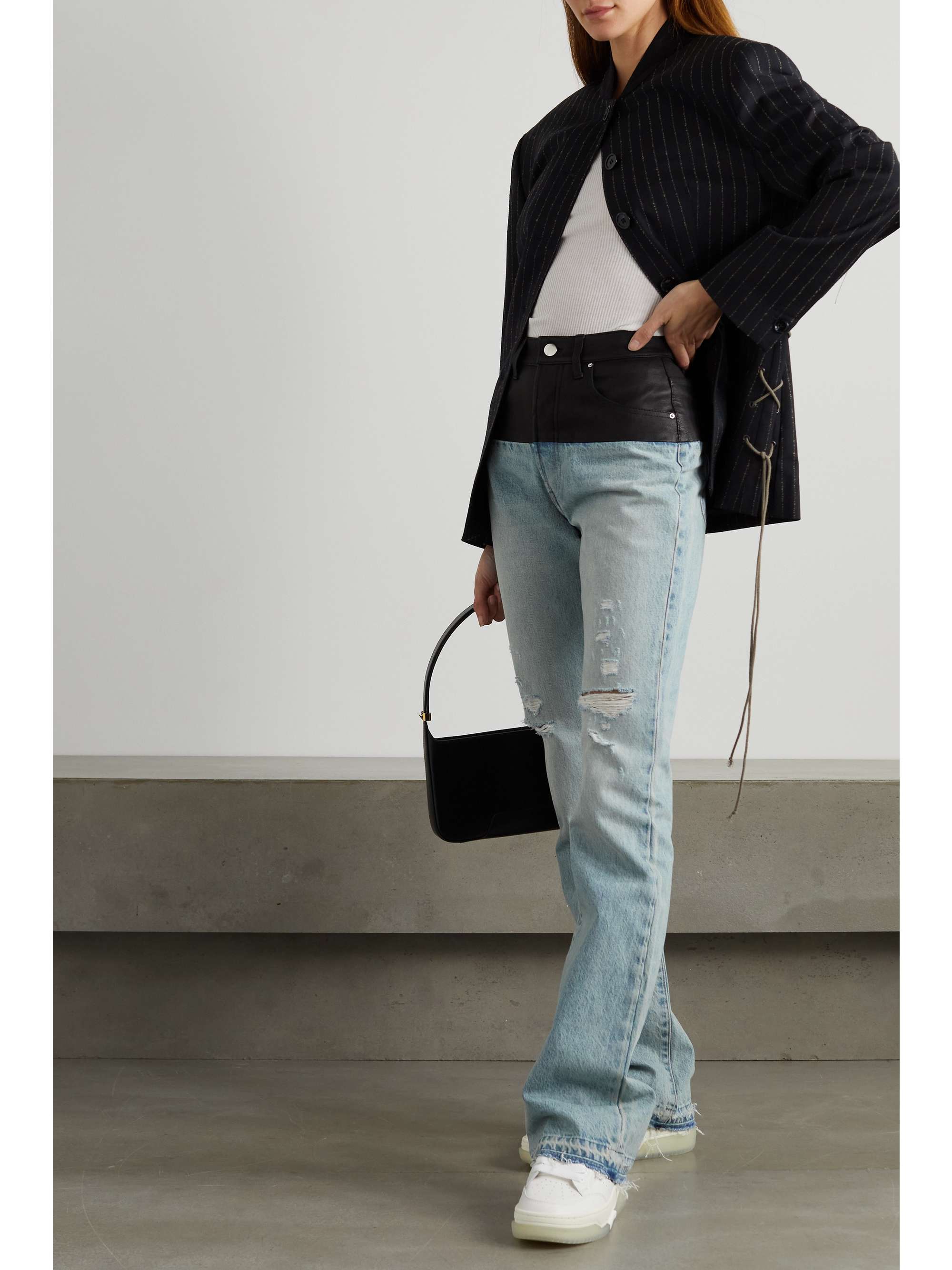 AMIRI Leather-paneled distressed denim high-rise slim-leg jeans