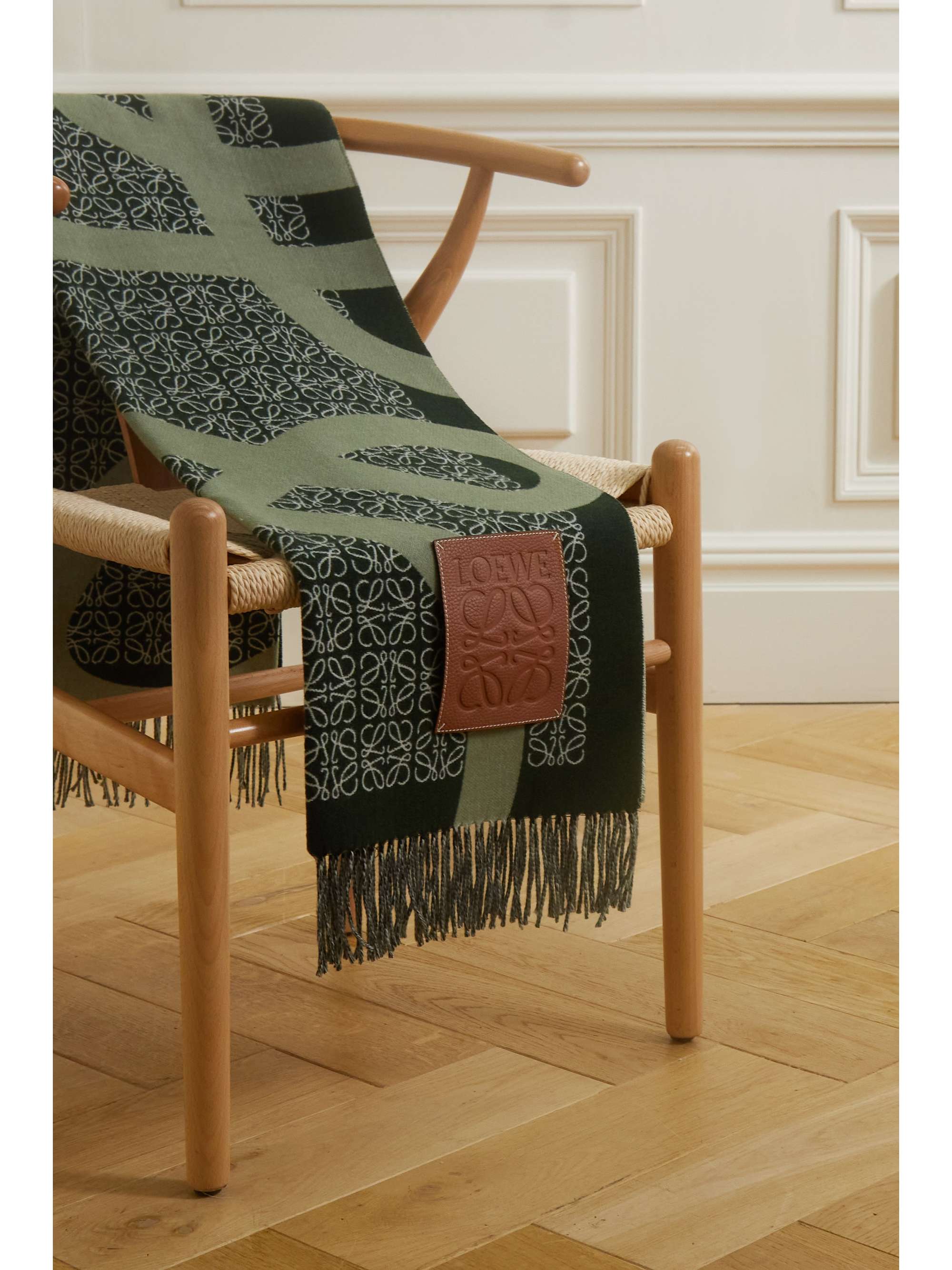 Texured leather-trimmed fringed wool-jacquard blanket