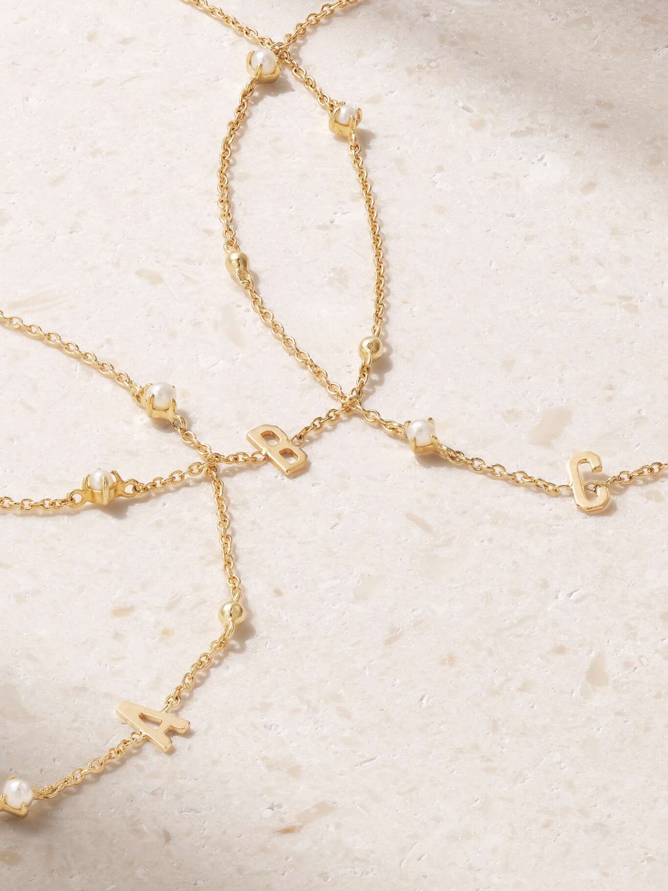 STONE AND STRAND Initial 14karat gold pearl bracelet NETAPORTER