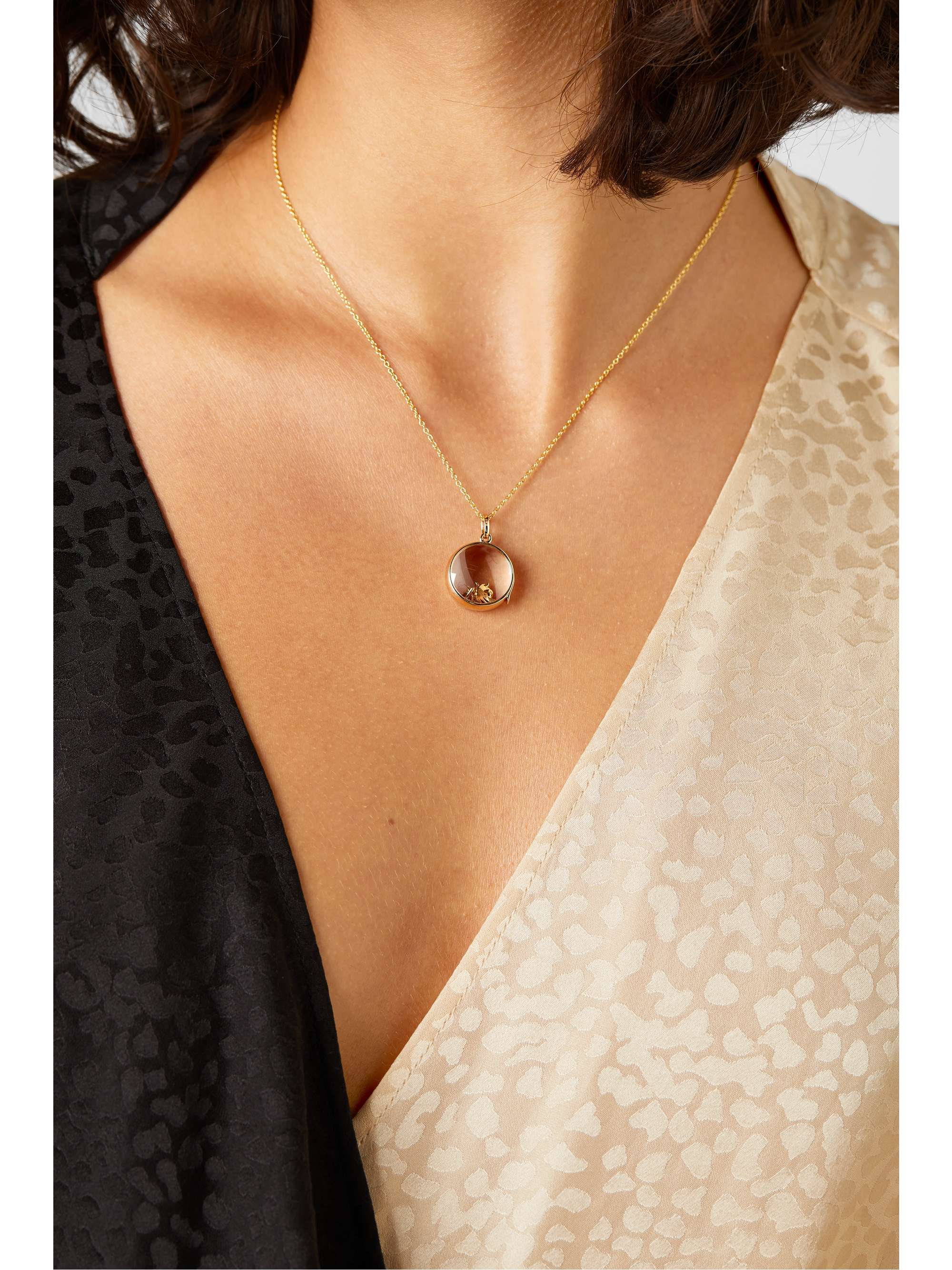 LOQUET 14-karat gold and sapphire crystal locket necklace
