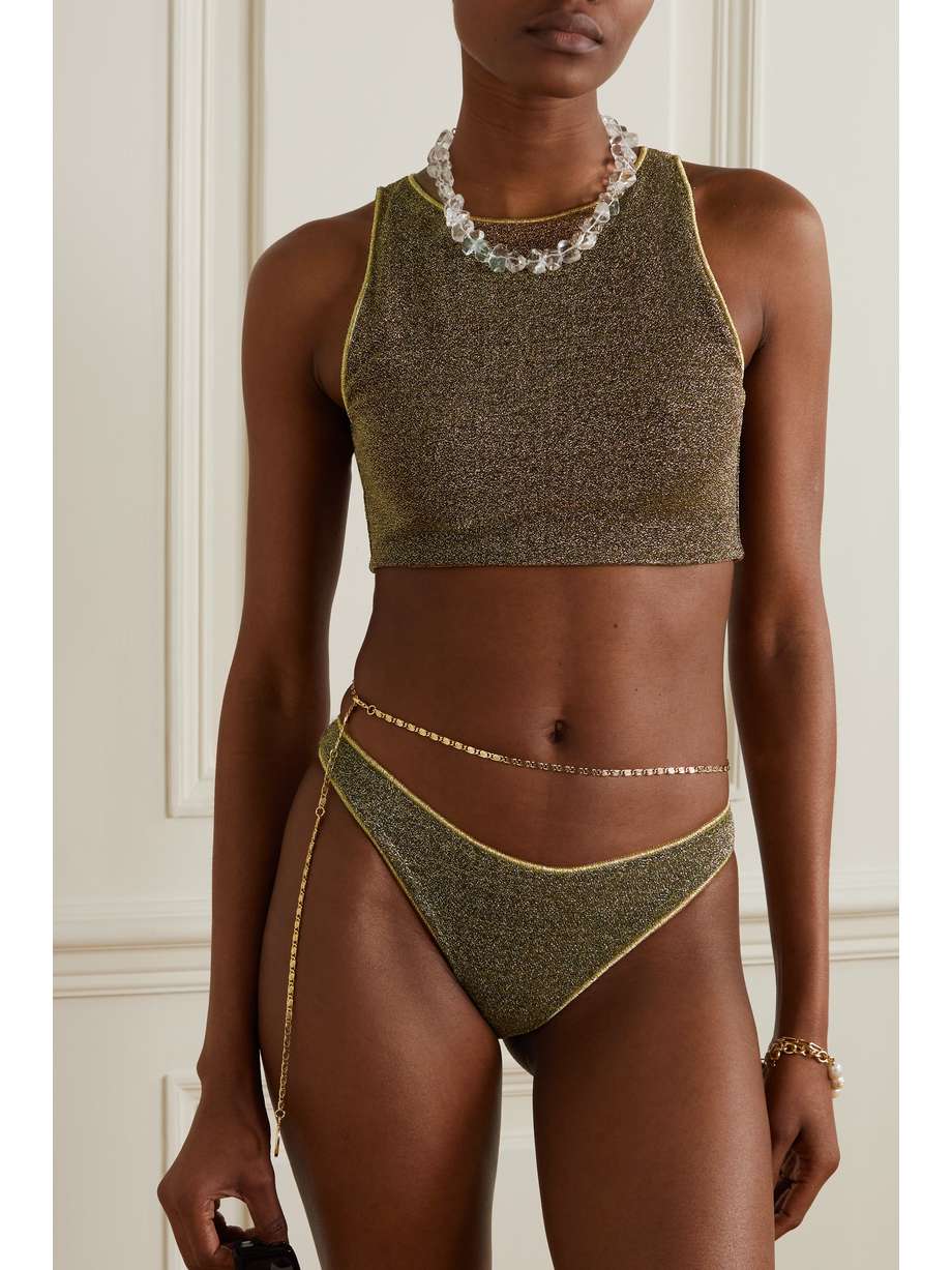 sleek, sporty cut Oséree bikini top made from sparkly gold stretch-Lurex and traced with gold piping. Pair yours with the matching briefs.