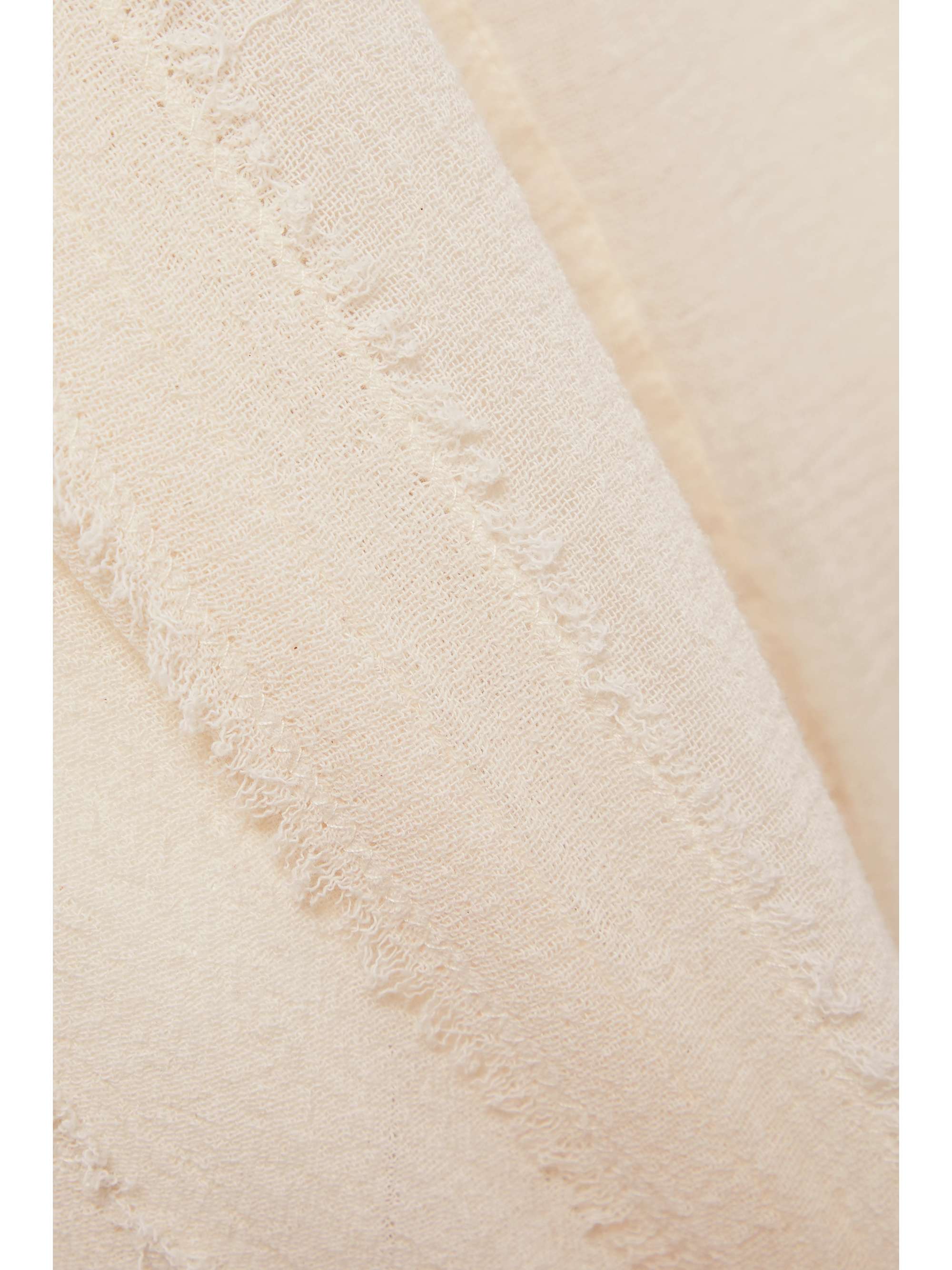 CARAVANA Sibinche frayed cotton-gauze track pants
