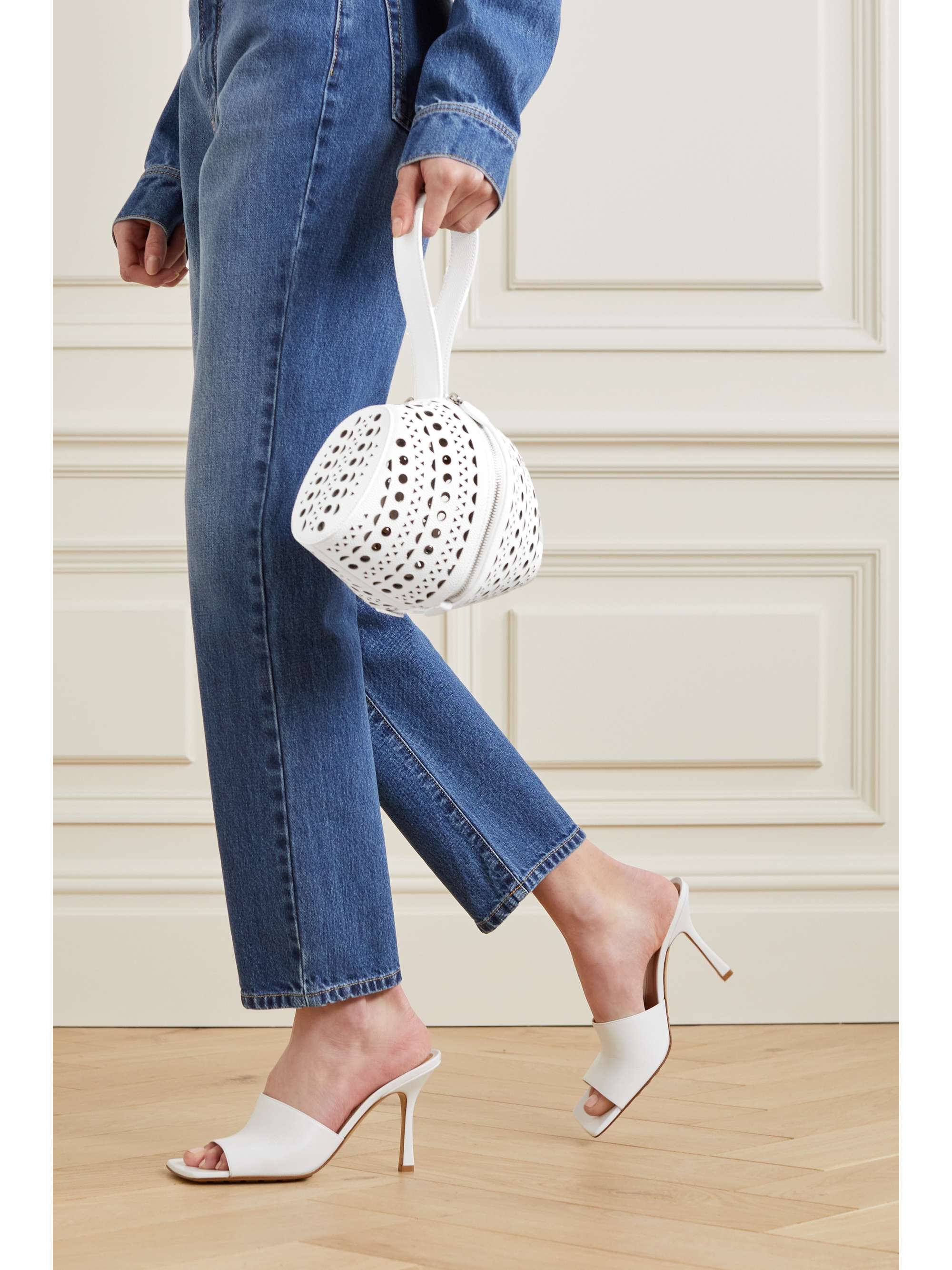 ALAÏA Shape studded textured-leather clutch