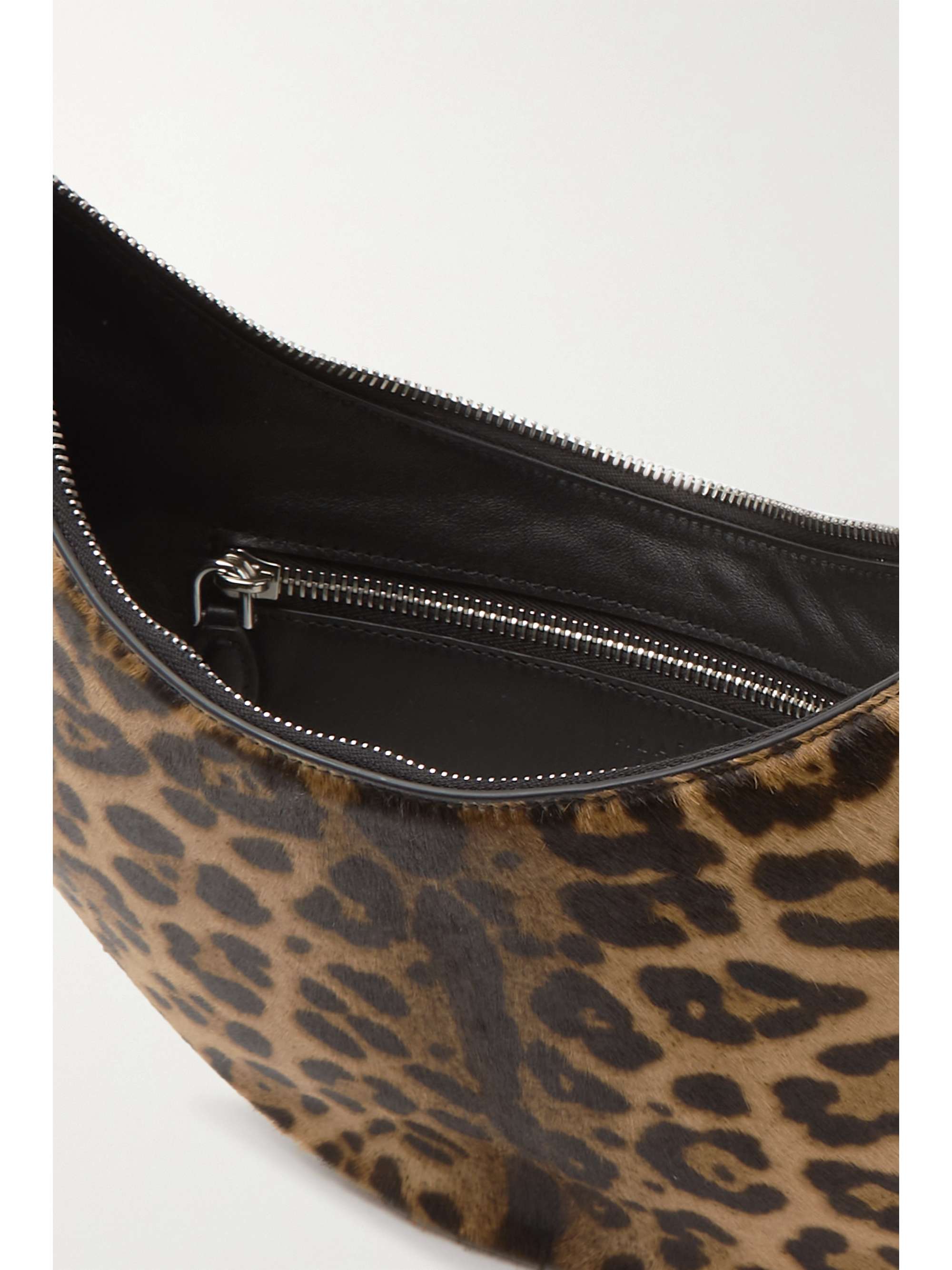ALAÏA Sac porté épaule en façon poulain à imprimé léopard Demi Lune