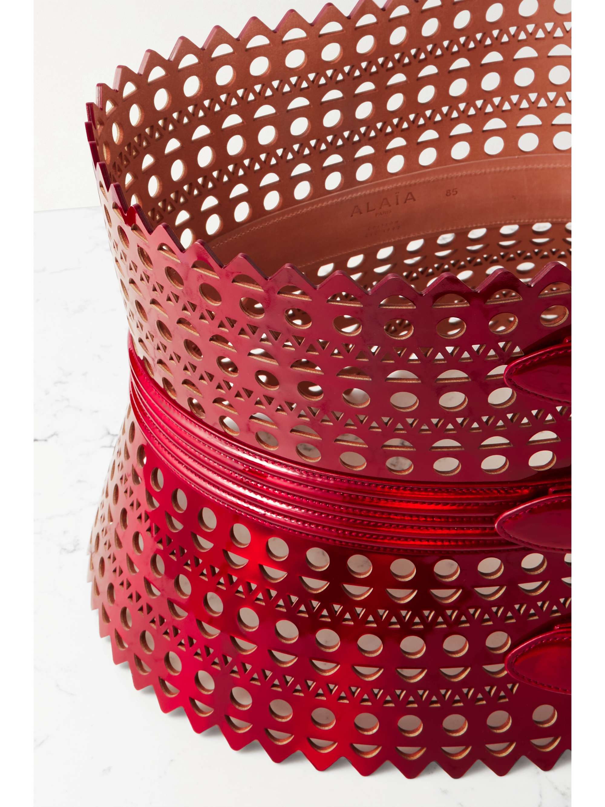 ALAÏA Laser-cut metallic leather waist belt