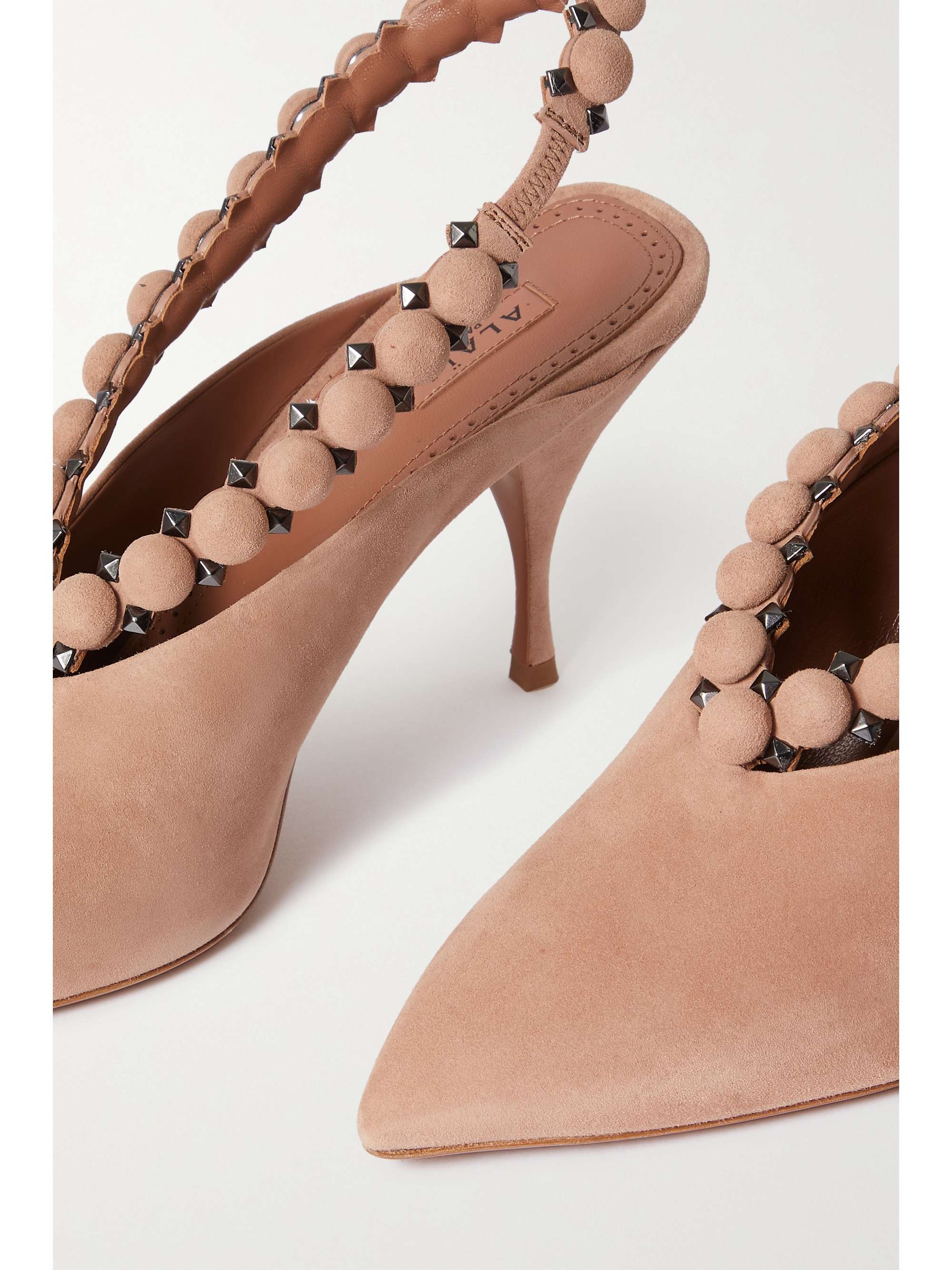 ALAÏA Embellished suede slingback pumps