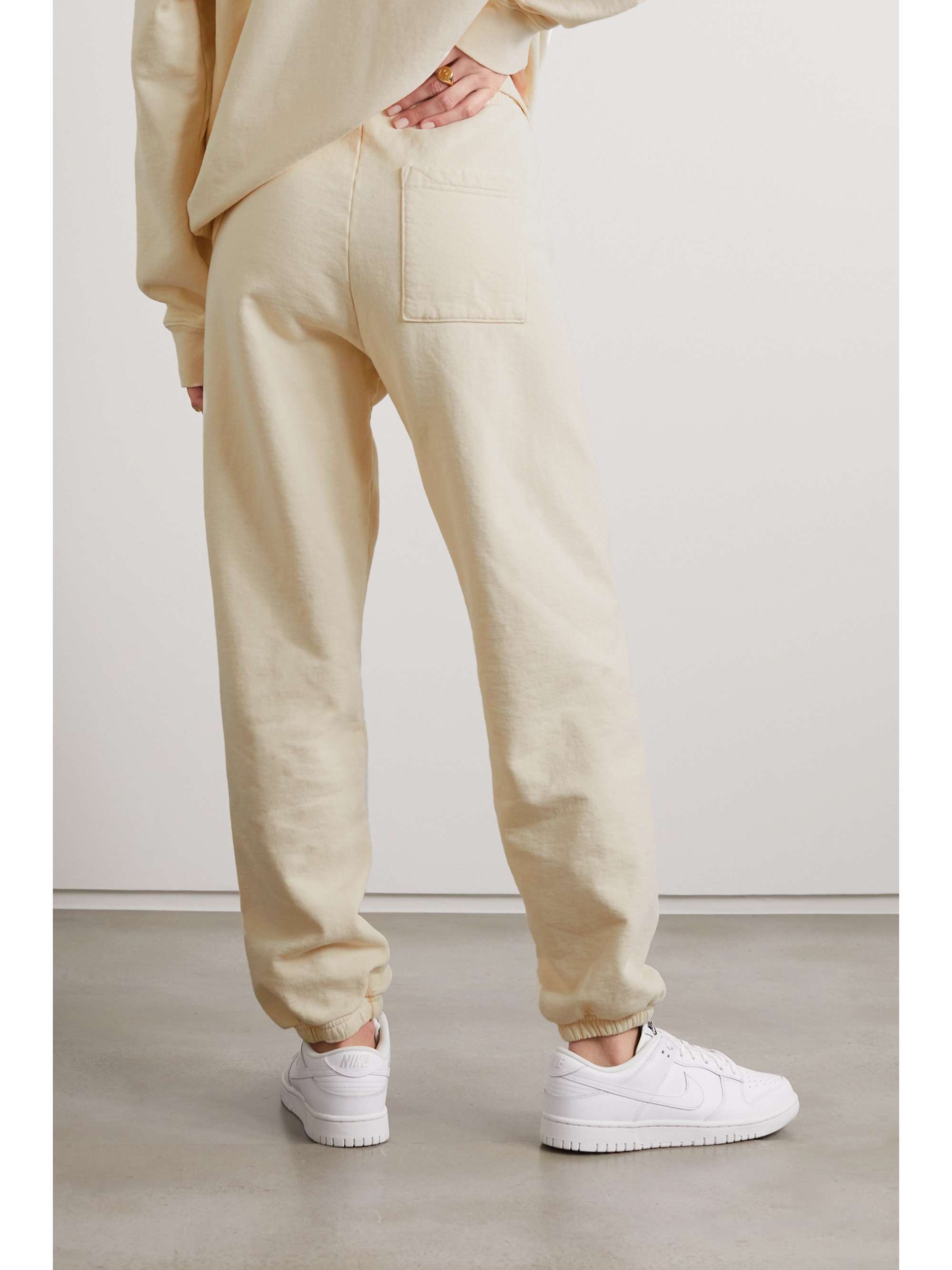 SPORTY & RICH + Prince printed cotton-jersey track pants