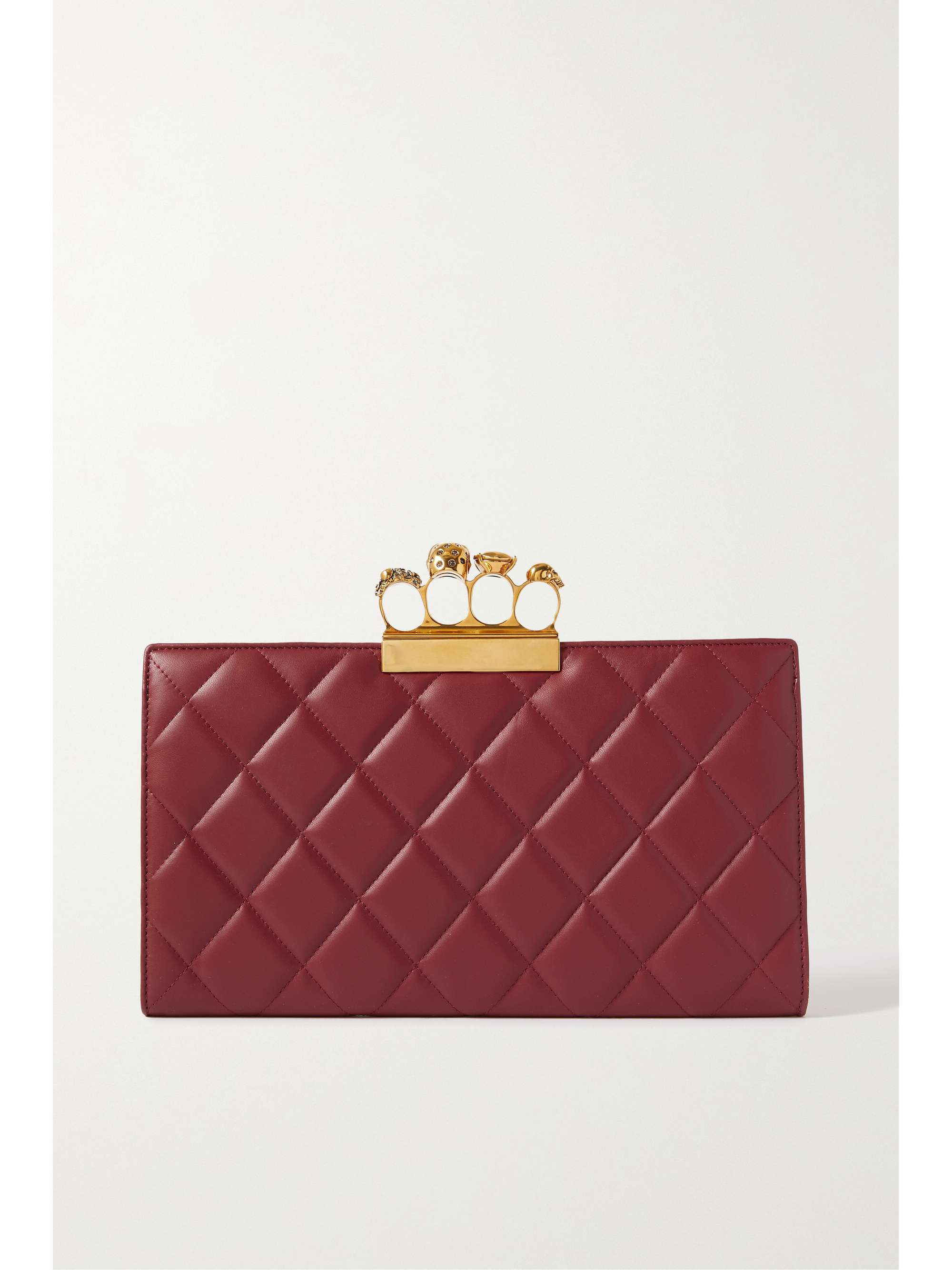 purse with brass knuckle handle